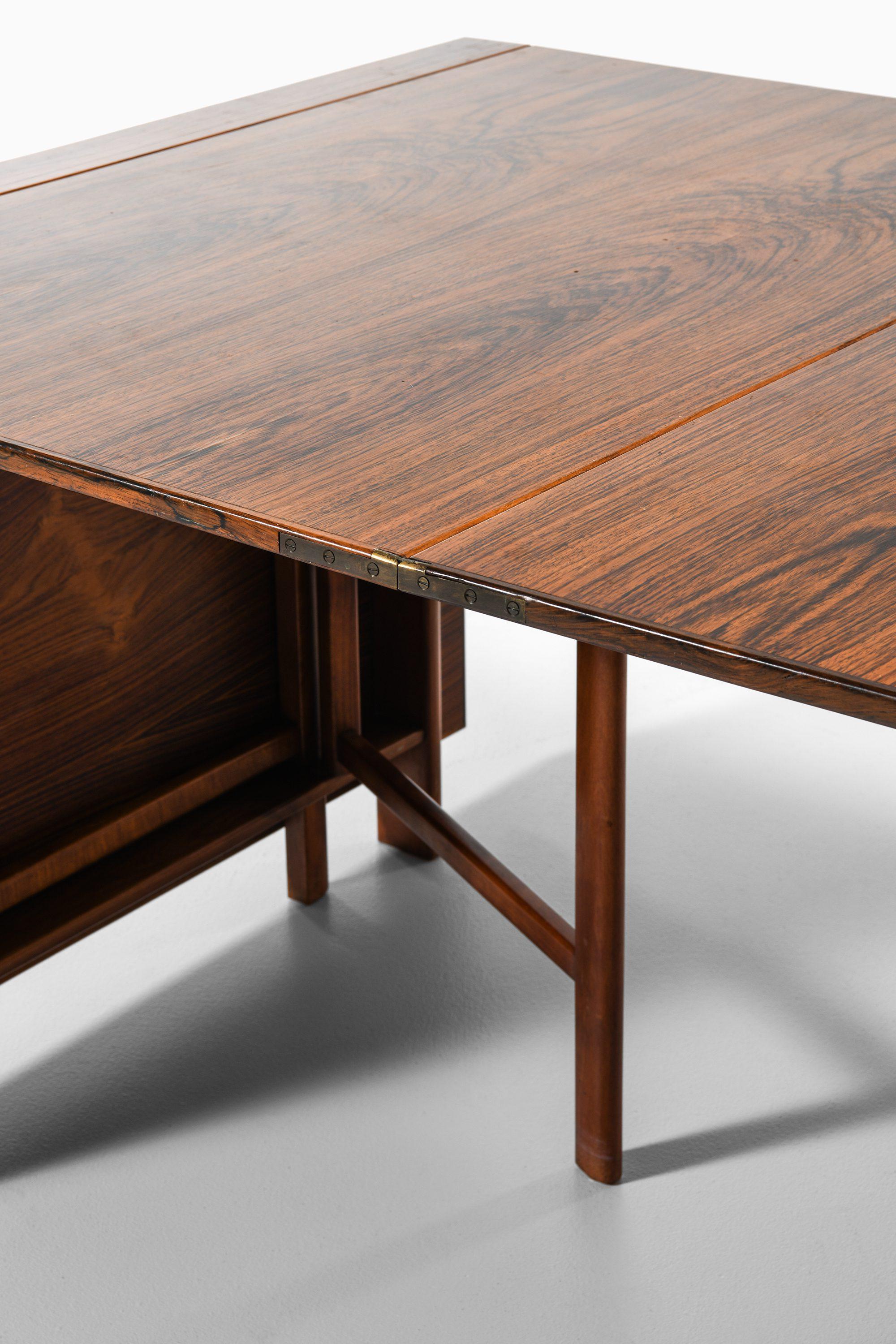 20ième siècle Table de salle à manger Maria à rabat en bois de rose, hêtre et laiton par Bruno Mathsson, années 1950 en vente