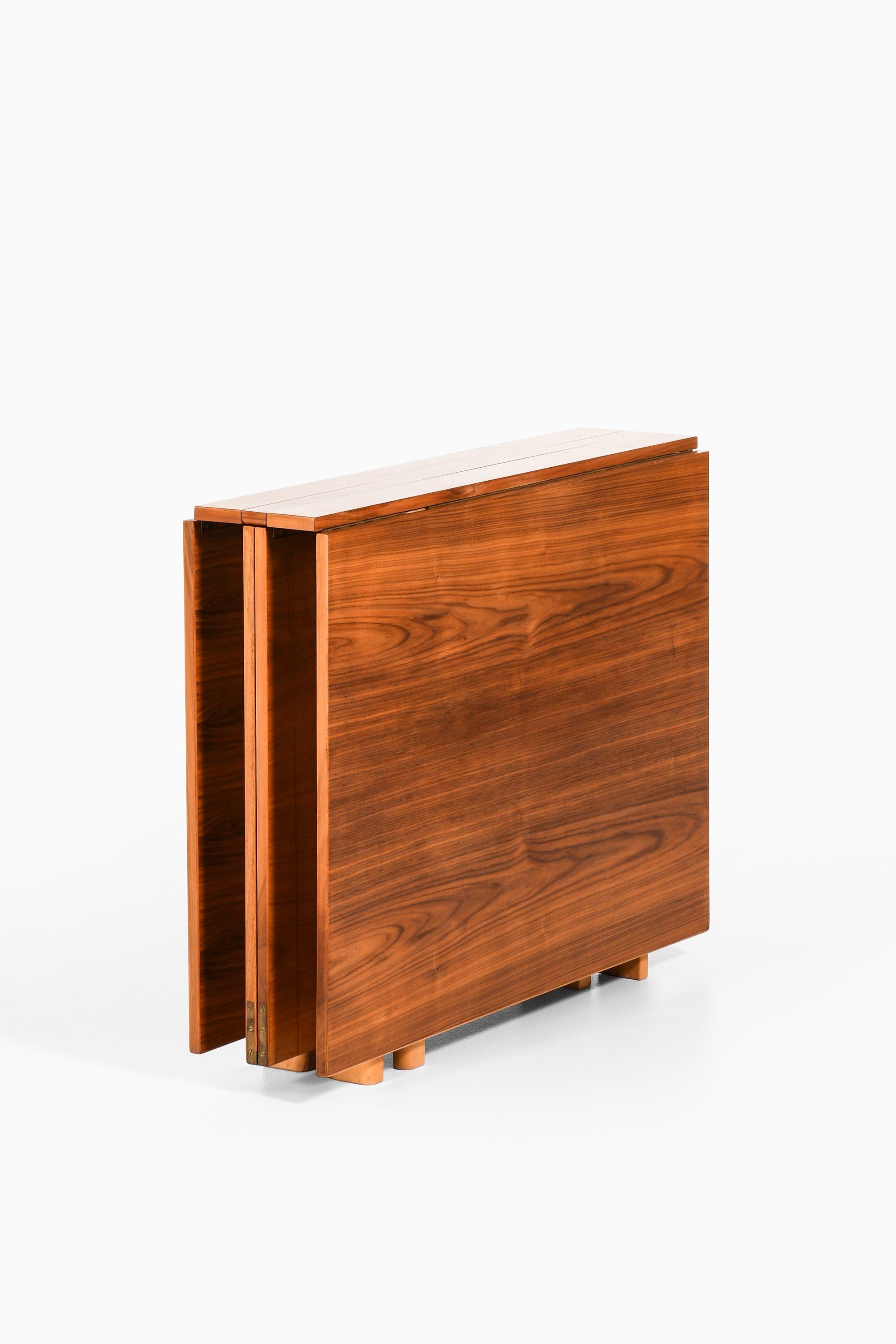 Maria Flap Dining Table in Walnut, Brass and Beech by Bruno Mathsson, 1968 For Sale 1