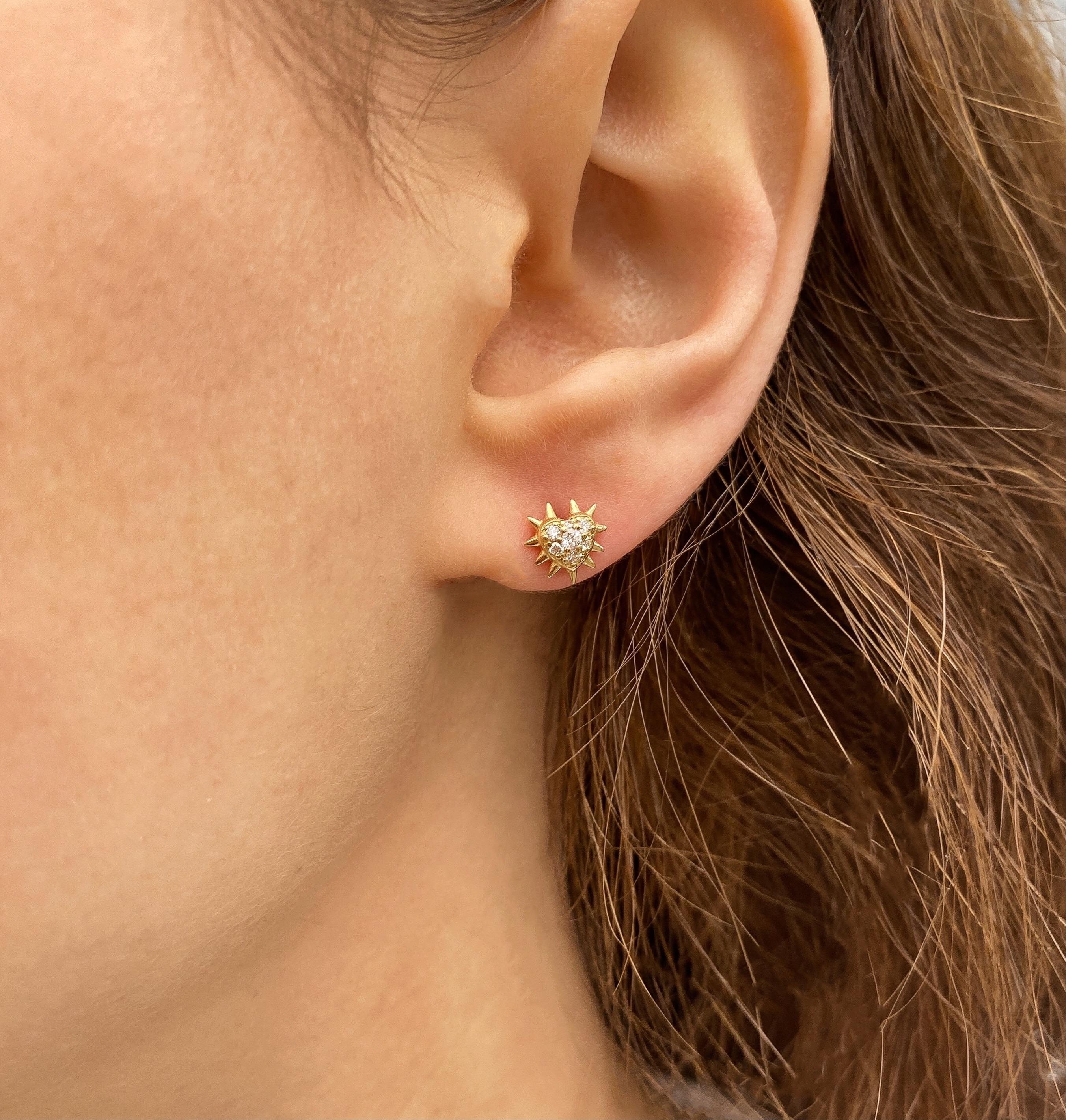 The ‘Thorny heart’ diamond studs are crafted in 18K gold hallmarked in Cyprus. These cute diamond heart studs, come in a highly polished finish and feature 0.15 Cts of White Diamonds. They will look equally impressive alone or layered and will most