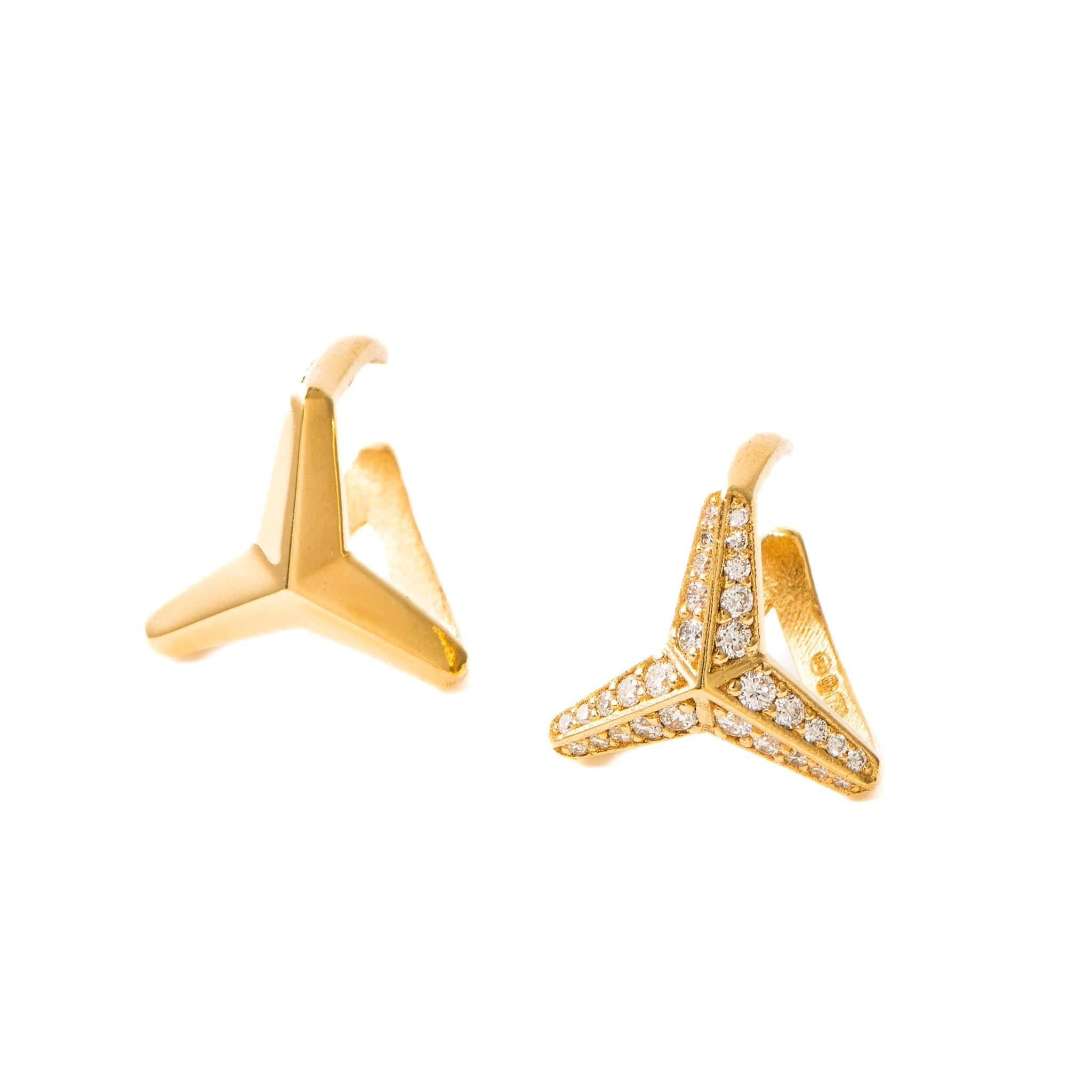 Crafted from 18K yellow gold and hallmarked in Cyprus, the Three Pointed Star small diamond ear cuff is a breathtaking accessory. This diamond ear cuff comes in a highly polished finish and is adorned with natural white diamonds that total 0.27 Cts,