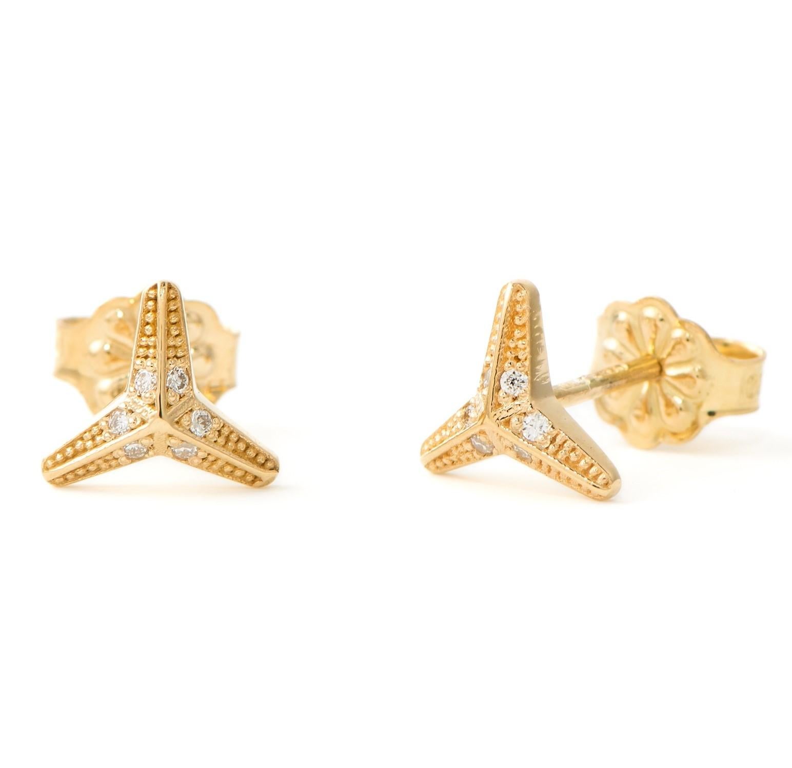The Three pointed star, ear studs are crafted in 18K yellow gold hallmarked in Cyprus. These super cute sculptural diamond ear studs, come in a highly polished finish and feature natural white Diamonds totalling 0,04 Cts, making them a valuable