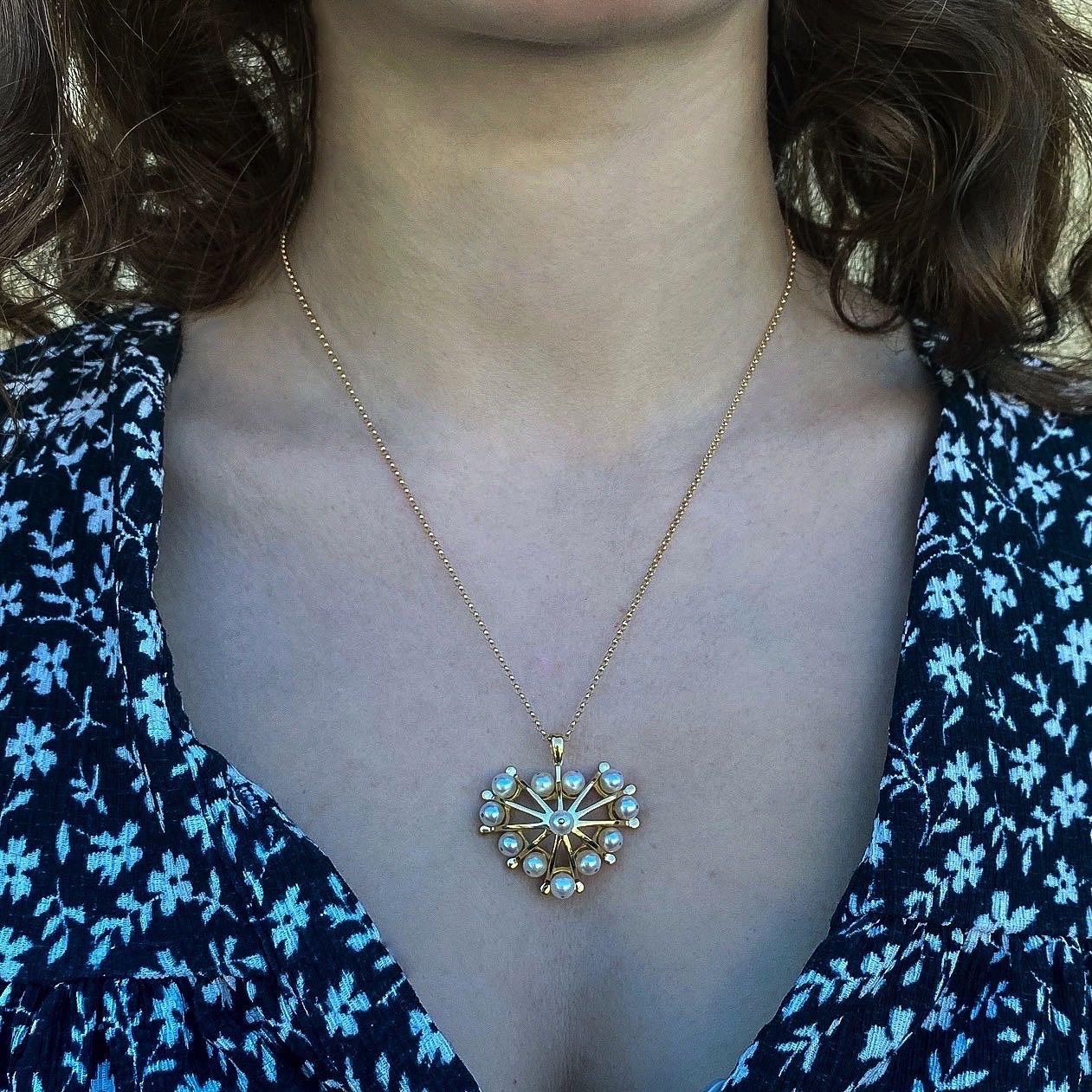 The ‘Pearl heart’, pendant is crafted in 18K gold hallmarked in Cyprus. This impressive, statement pendant comes in a highly polished finish and features 12 white Akoyia Pearls. Model wears it on a 50 cm long chain. Chain is sold separately. The