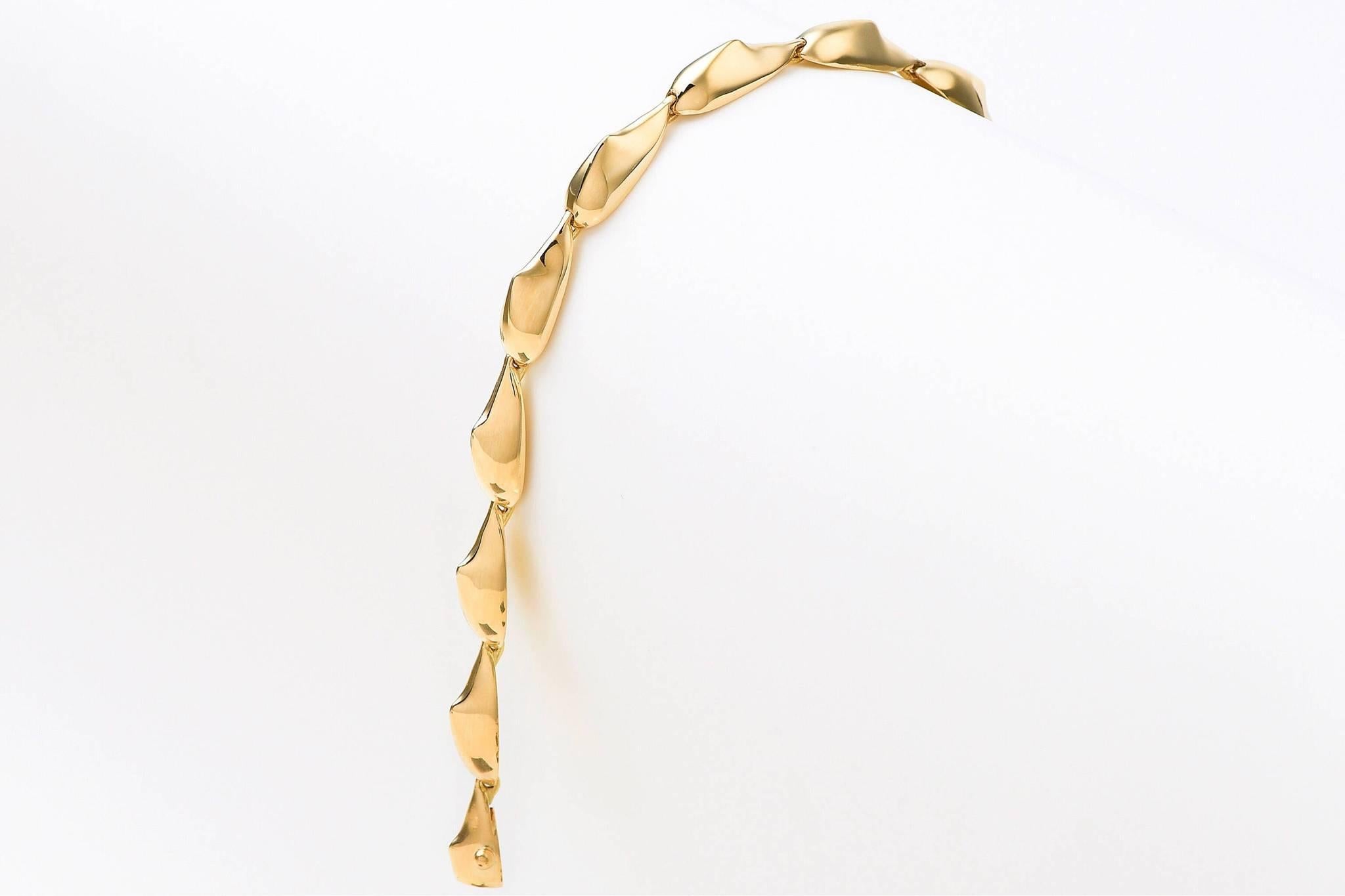 The ‘Spiked’ link bracelet is crafted in 18K yellow gold, hallmarked in Cyprus. This elegant, sculptural bracelet comes in a highly polished finish and is composed of sculptural parts, masterfully linked between them to allow a graceful movement