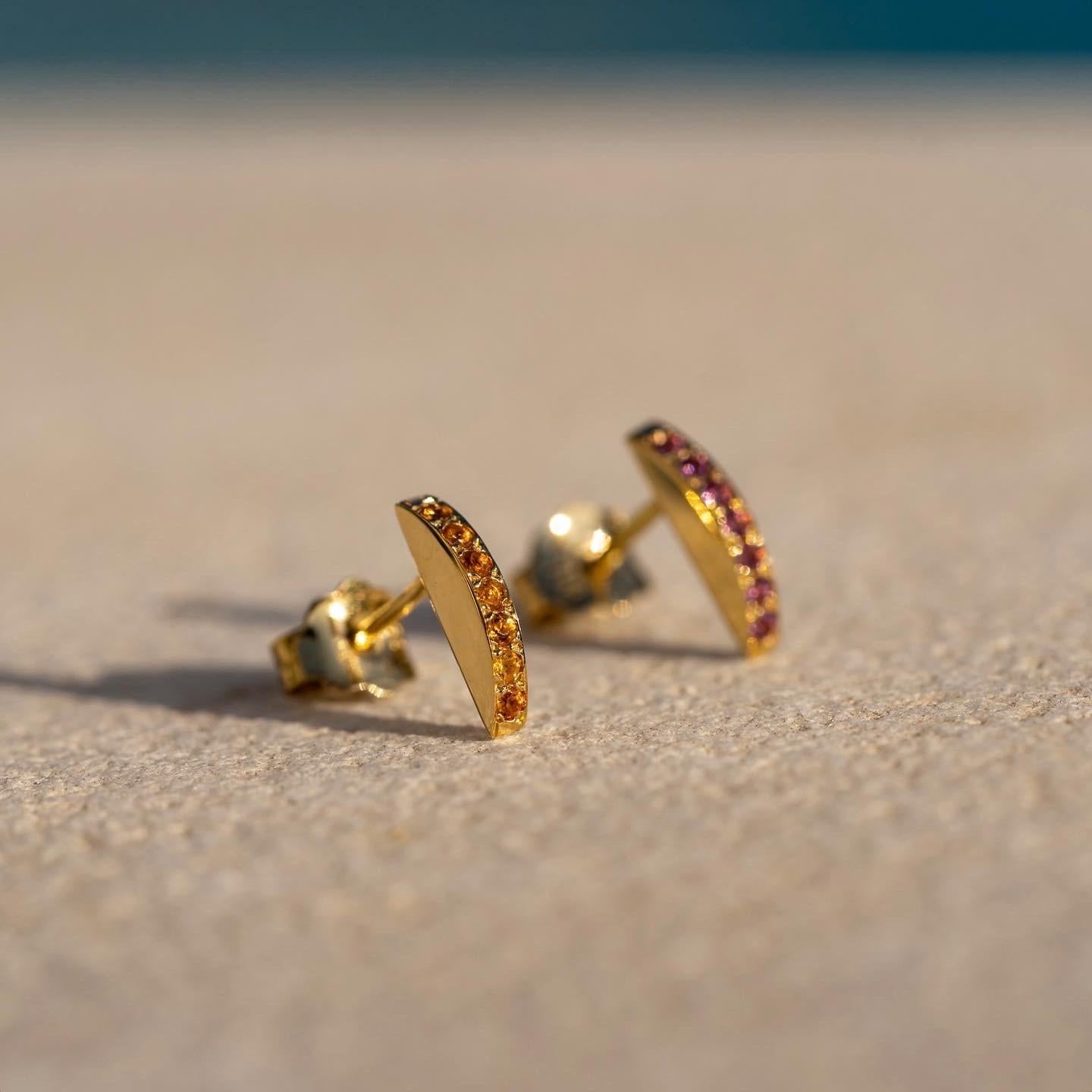 The 'Section’, studs are crafted in 18k gold, hallmarked in Cyprus. These discreetly impressive, super cute studs come in a highly polished finish and feature Madeira Citrines totalling 0.14 Cts. Worn separately or stacked, these versatile studs can