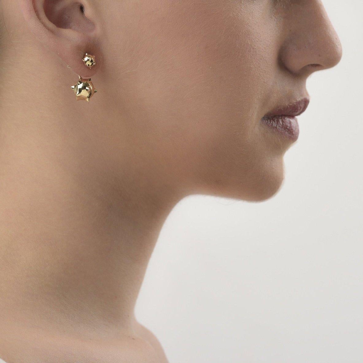 The ‘Morning Star’ ear jackets are crafted in 18K gold, hallmarked in Cyprus. These impressive, three piece ear jackets come in a highly polished finish and make the perfect choice for every occasion. The small spiked domes can be worn separately as