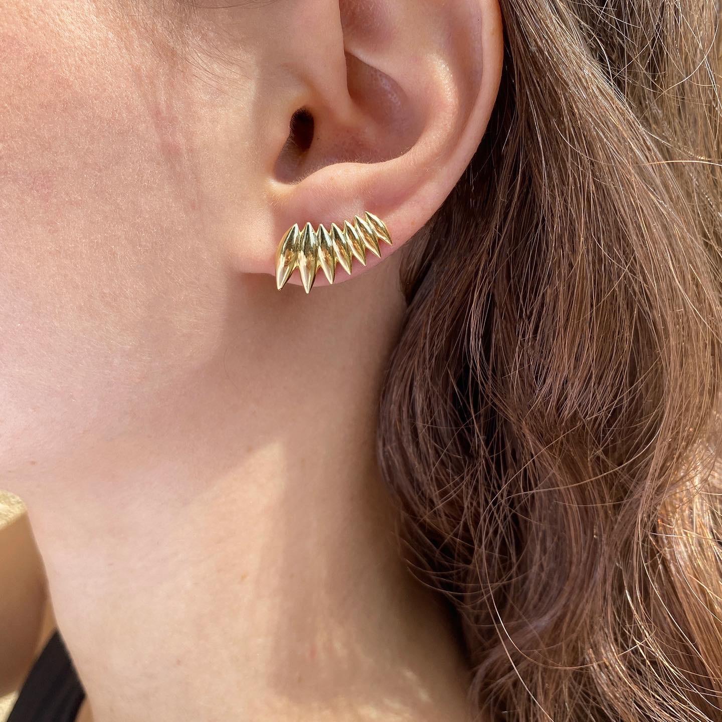 The ‘Grain array’ ear climbers are crafted in 18K gold hallmarked in Cyprus. These stunning ear climbers, come in a highly polished finish and feature an adjustable wire fastening that ensure a comfortable and secure fit. The ‘Grain array’ ear