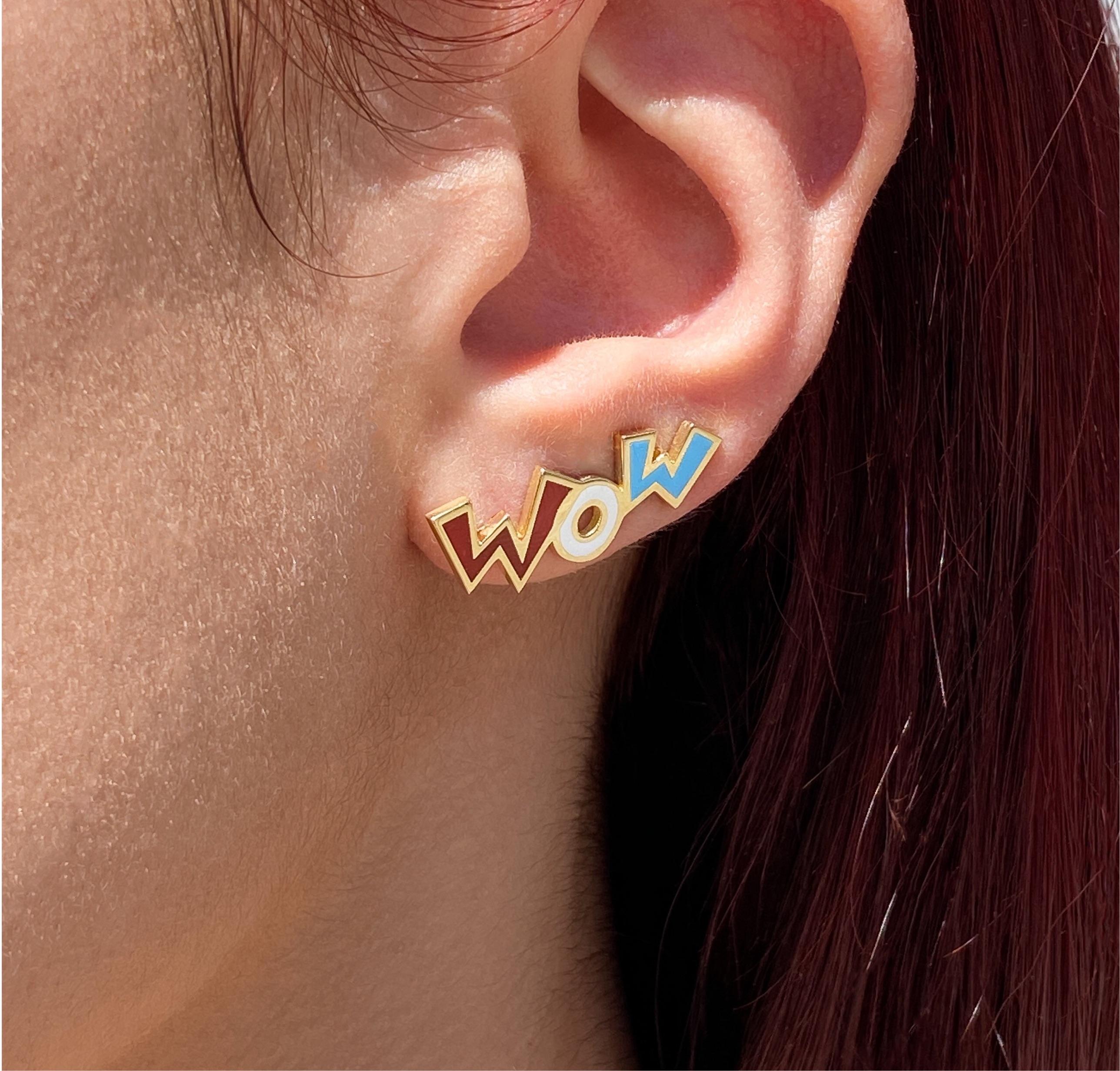 The Wow, ear climbers are crafted in 18K yellow gold, hallmarked in Cyprus. These fun and colourful climbers come in a highly polished finish and feature red, white and blue enamel. They are very comfortable on the ear and are securely held in place