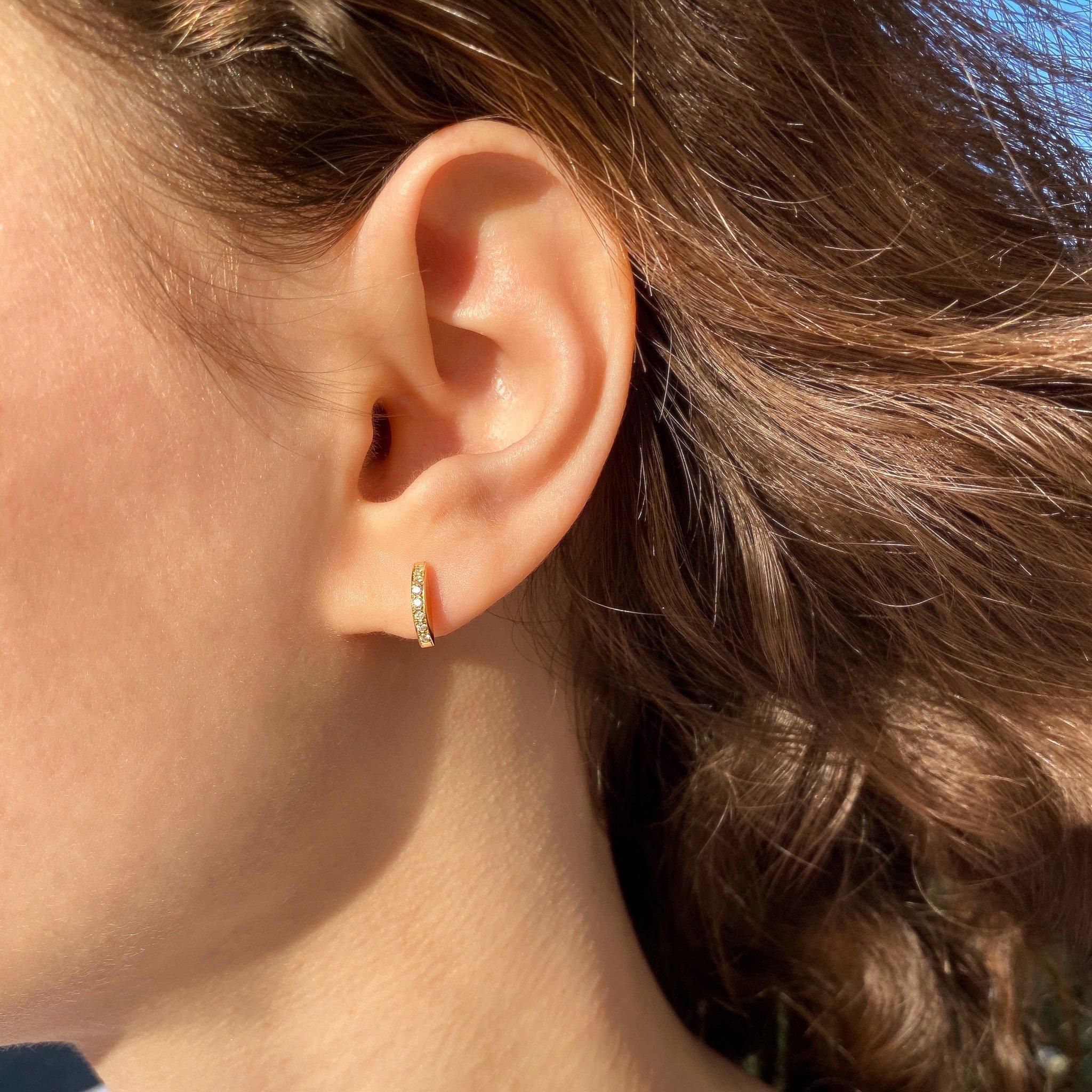 The 'Section’, stud earrings are crafted in 18k gold, hallmarked in Cyprus. They come in a highly polished finish and feature a total of 0.14 Cts White, VS Diamonds. Worn separately or stacked, these versatile, super cute studs can easily become