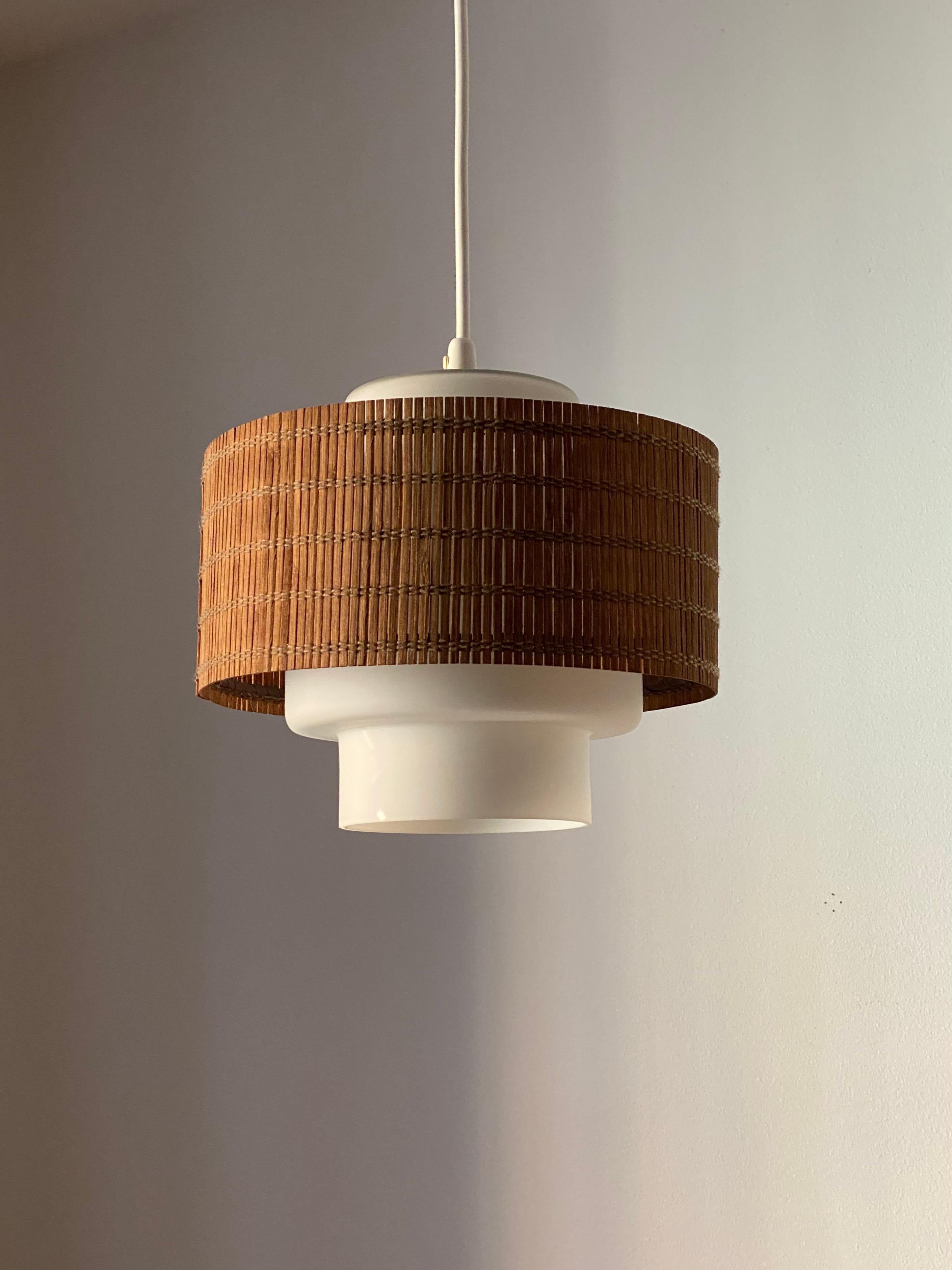 A ceiling light / pendant light. Designed by Maria Lindeman, produced by Idman, Finland, 1950s.

Stated dimensions excluding ceiling cup and cord.

Other designers of the period include Paavo Tynell, Lisa Johansson-Pape, Alvar Aalto, Ilmari