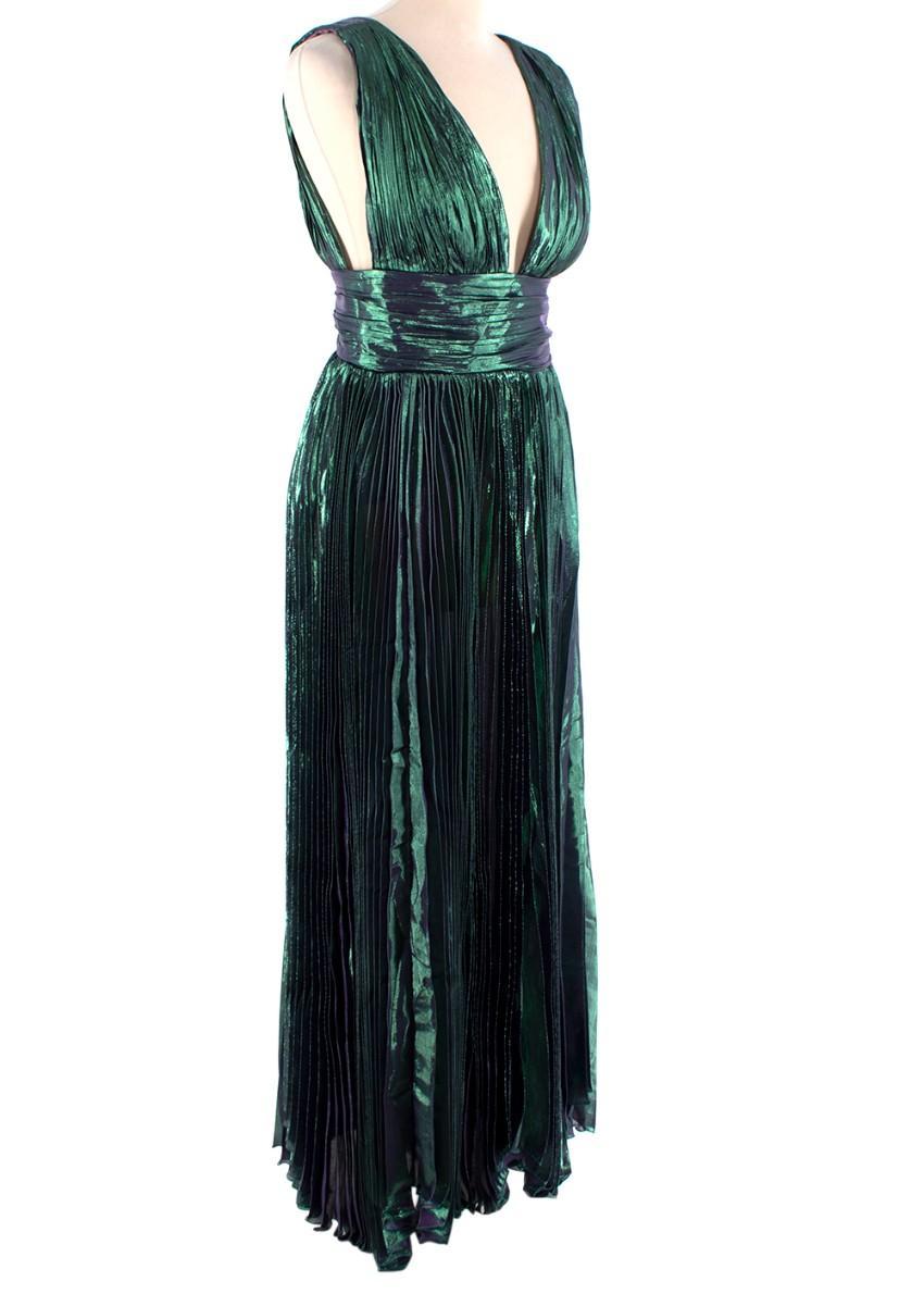 Maria Lucia Hohan Iridescent Green&Purple Pleated Maxi Dress

- Reva gown
- The pleated silk-blend fabric brings a fluid dimension to the feminine silhouette
- Shaped with a deep V-neckline
- Corresponding thigh-high slit
- Mauve-purple stretch-mesh