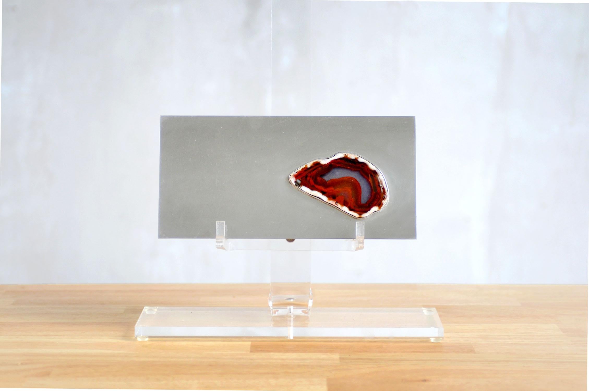 Maria Pergay (1930), Large flat box in silver metal, France 1970. A red-veined Agathe stone is set on the lid, the interior is dressed in exotic wood. Excellence of the realization, beauty of the materials, elegance of the design are united in this