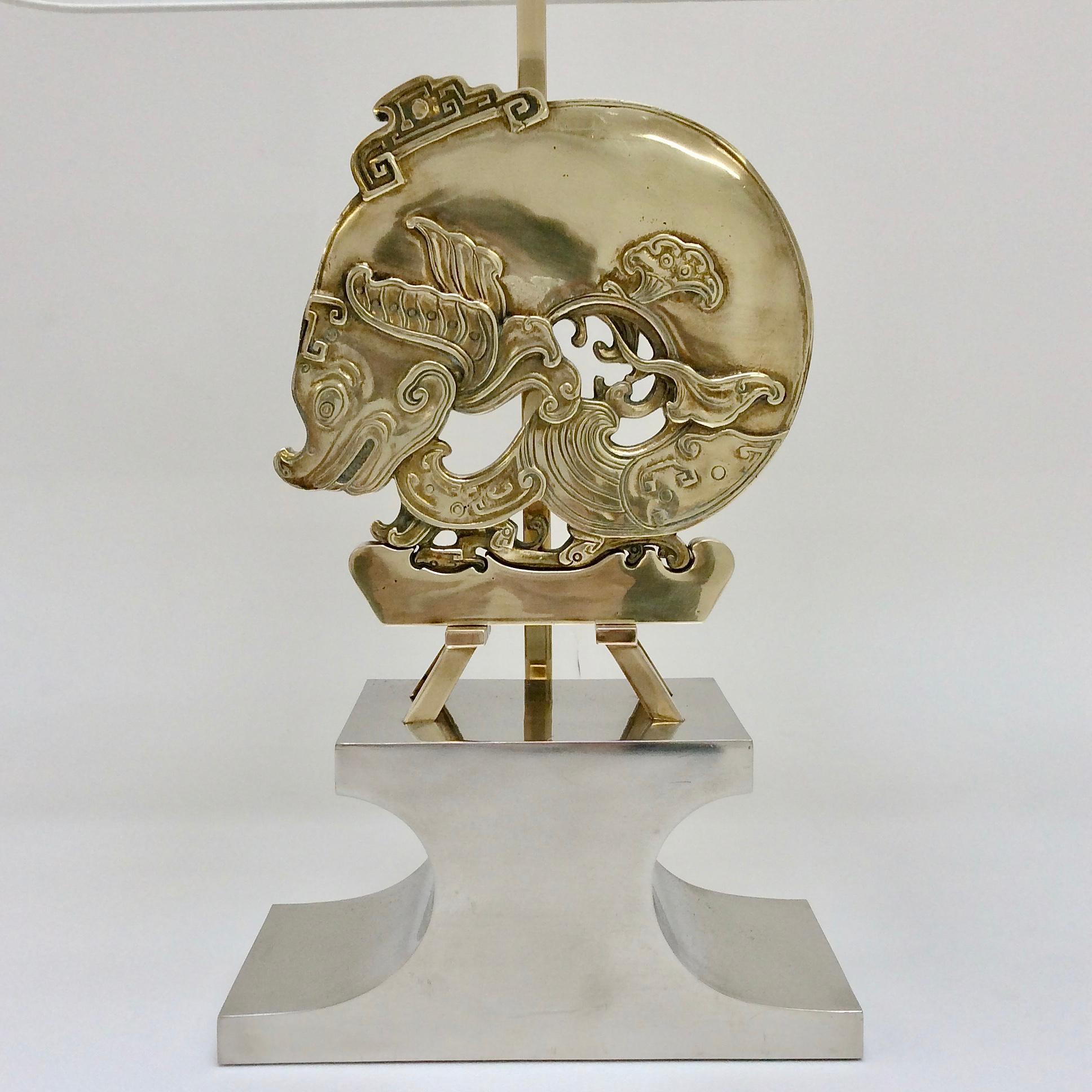 Rare Maria Pergay Dragon model table lamp, circa 1974, France.
Gold bronze and stainless steel.
New ivory fabric shade.
Two E27 bulbs of 60 W.
Dimensions: 84 cm H, 49 cm W, 25 cm D.
All purchases are covered by our Buyer Protection