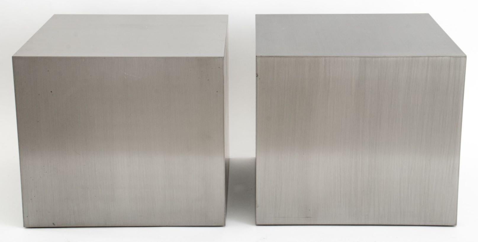 Pair of Maria Pergay (French, born Moldova, b. 1930) Stainless Steel Cube Tables, circa 1970s, labels to undersides.

Dealer: S138XX