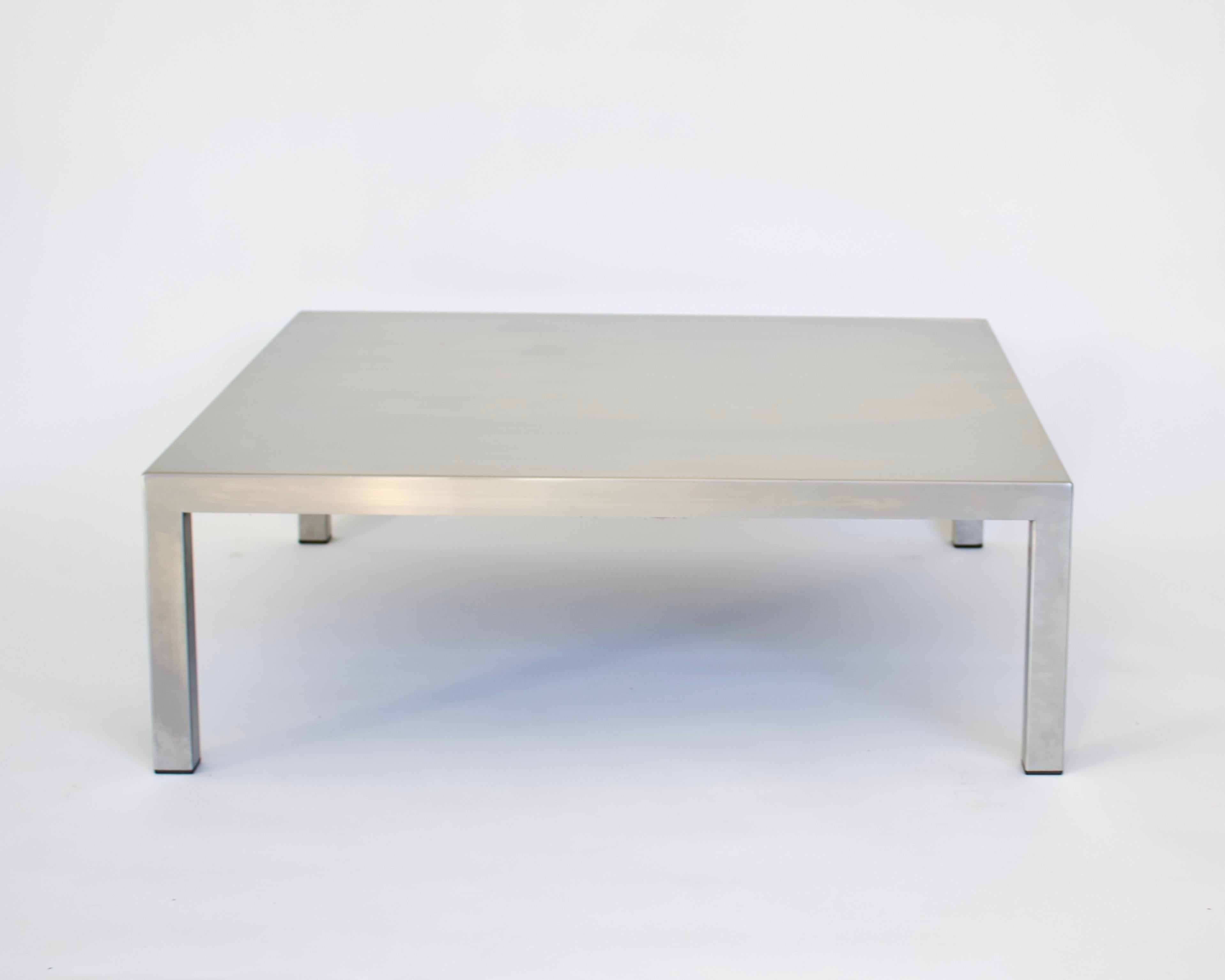 A matte stainless steel coffee square table by Maria Pergay for Creative Design Steel with Marina Varenne, 1970, Paris. The designers iconic use of this material is displayed in one if her most simple minimalist designs.
Minimalist design and of the