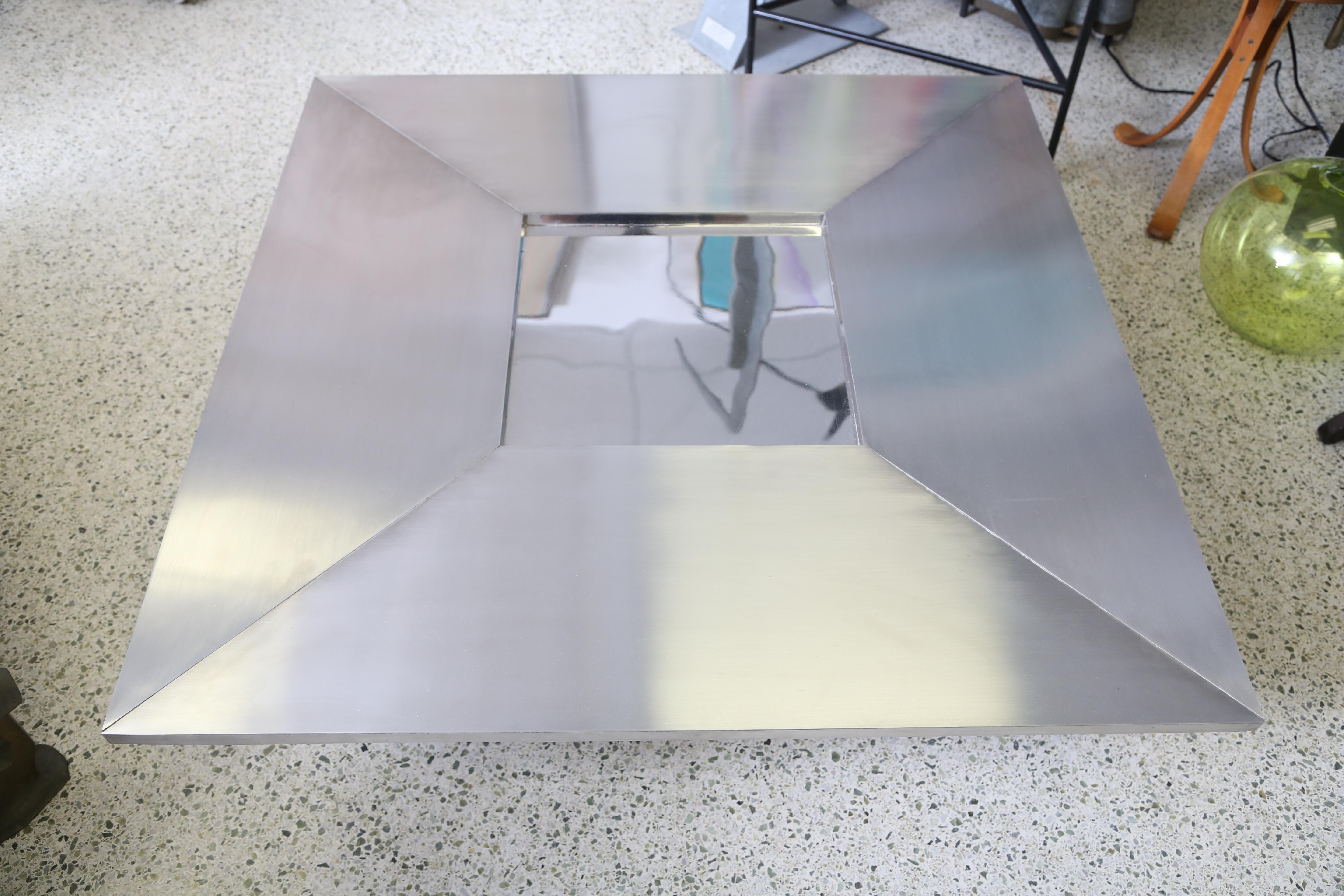 Brushed and polished stainless steel
Manufactured by Design Steel, 1970
Mirror in the middle of the table.

