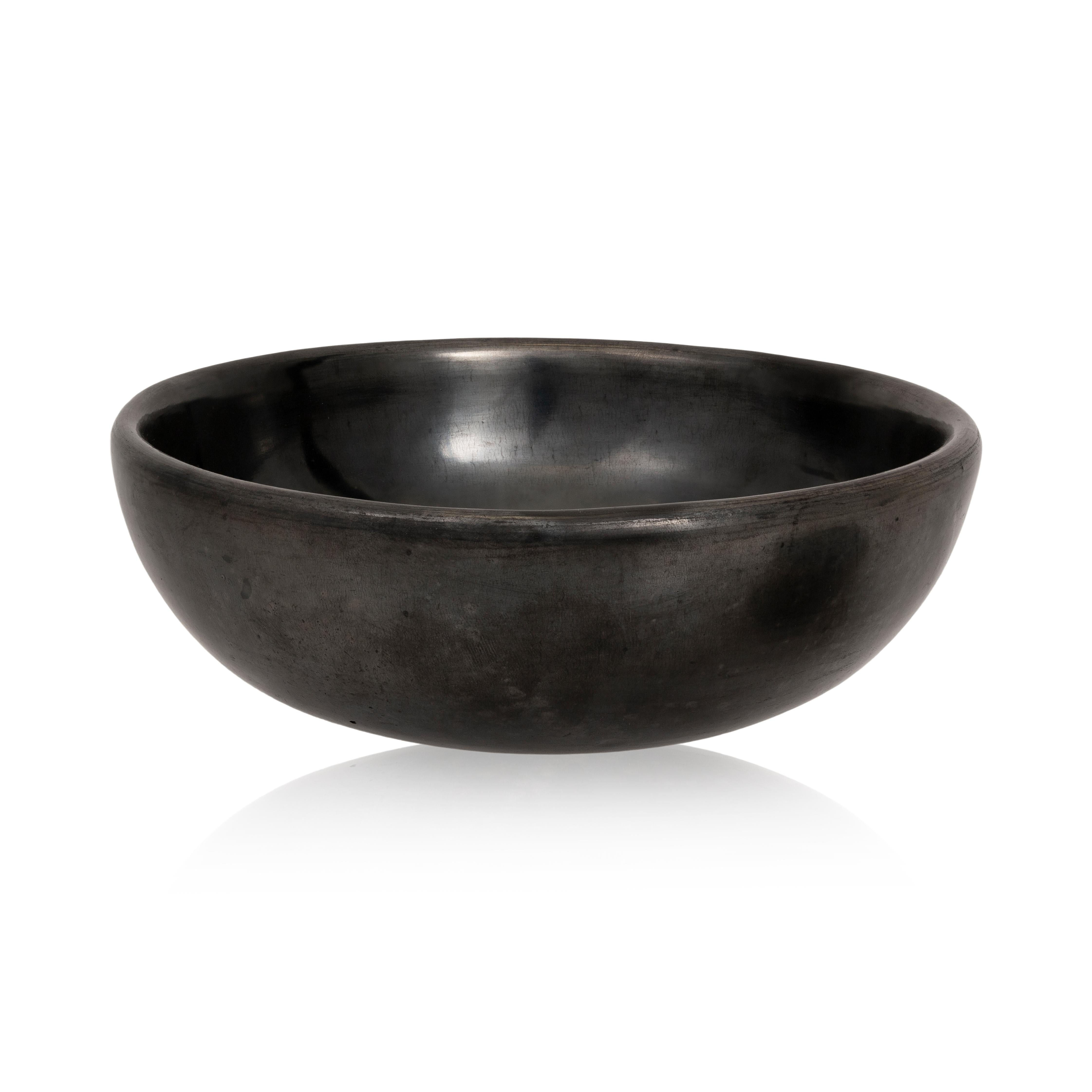 Black on black pottery bowl with gunmetal finish, signed Maria Poveka. 1956 - 1965; 7 3/4