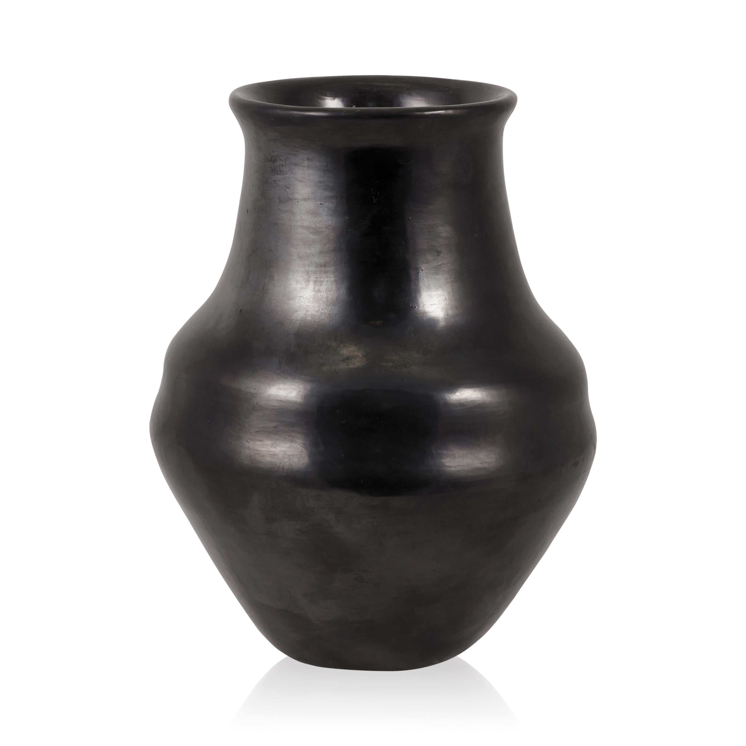 Black on black pottery jar with gunmetal finish, signed Maria Poveka. 1956 - 1965; 6