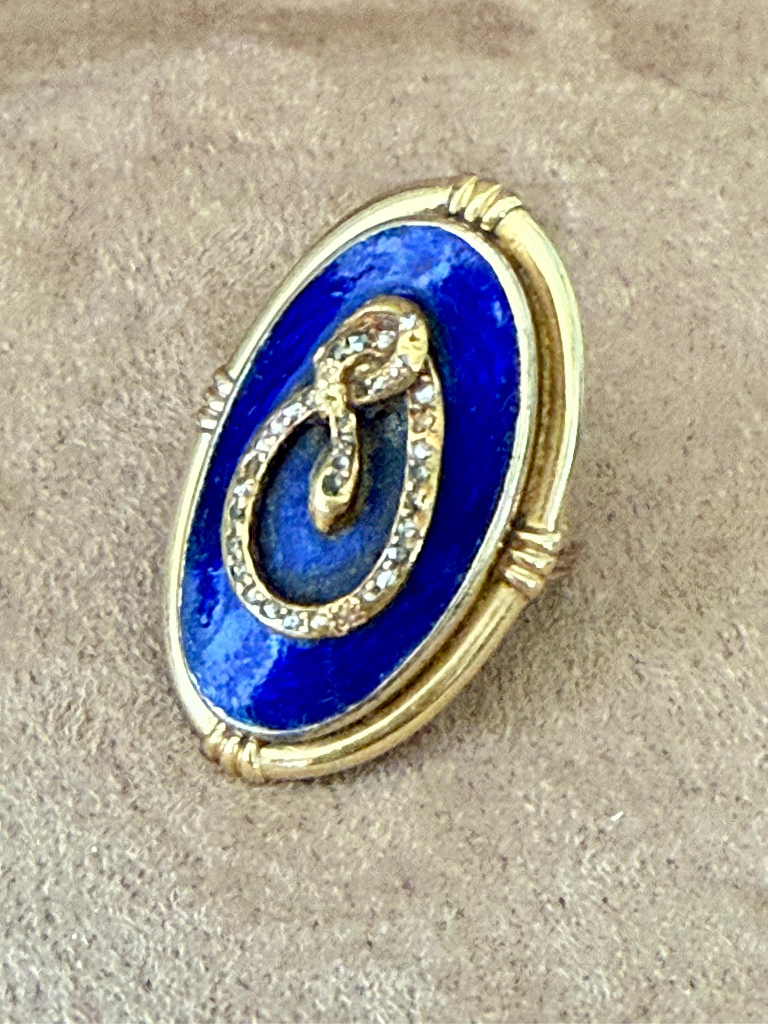 18 K yellow Gold Ring with blue Enamel and Snake motif  that belonged to world famous actress Maria Schell (15.1. 1926-26.4.2005).  From the esate of Maria Schell's daughter Marie Theres Relin.
The Ring is currently size 53/13 but can easily be
