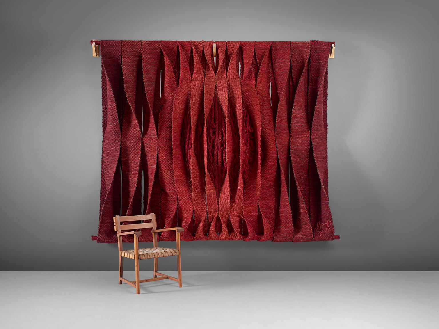 Maria Tapta, wall hanging art work, in mixed textiles, Belgium, 1976.

Stunning large wall sculpture in divers textiles and mixed techniques. This tapestry consists of several woven straps in all shades of red and orange. Due their twists these