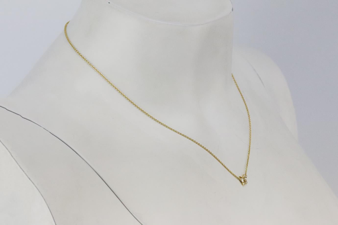 Maria Tash butterfly 18k yellow gold and diamond chain necklace. Made from yellow-gold with diamond butterfly pendant and small chain. Yellow-gold. Lobster clasp fastening at back. Does not come with box or dustbag. Chain Length: 17.4 in. Pendant