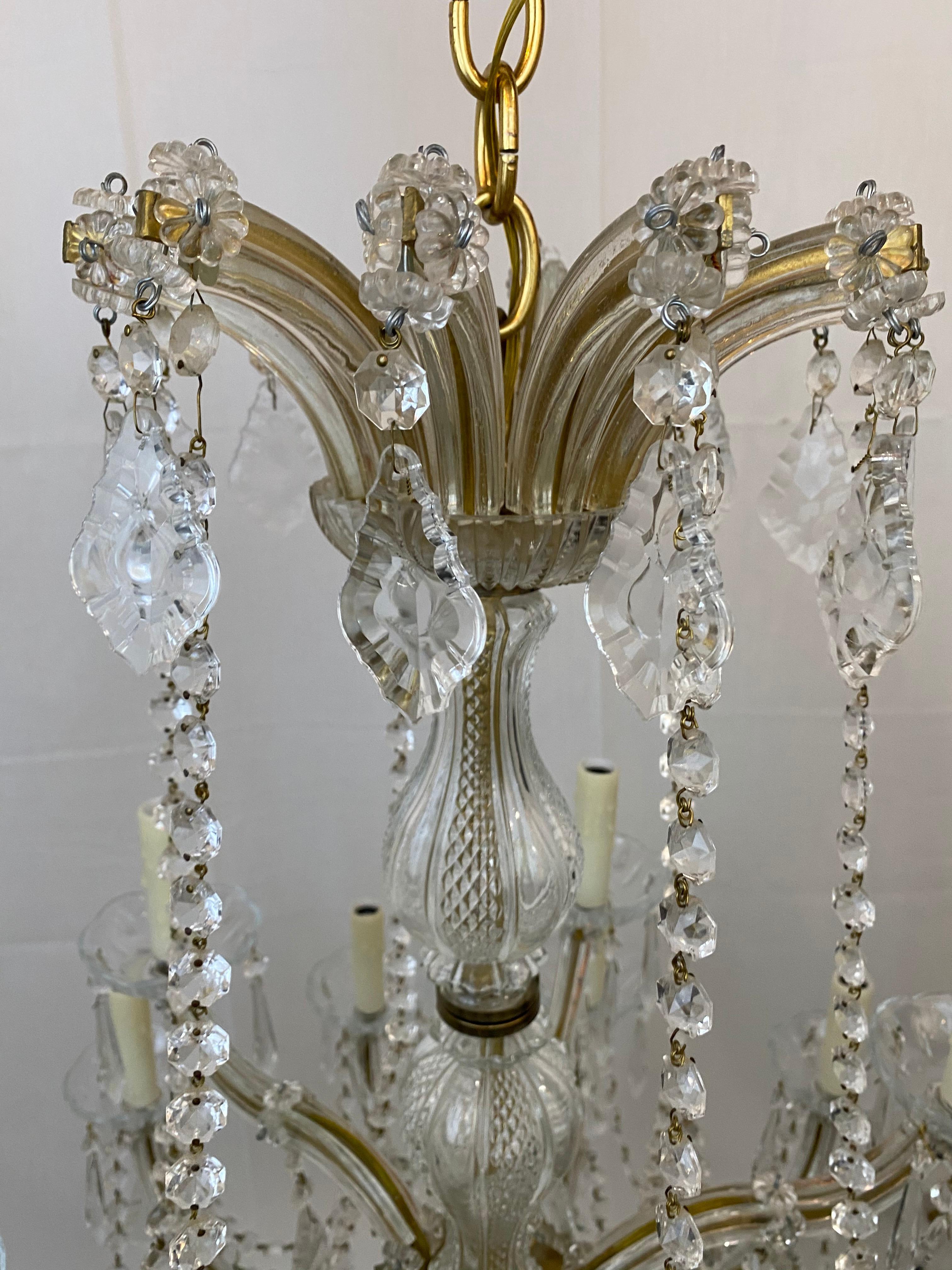Maria Teresa, antique crystal chandelier, 18-light, with 4' wax candle covers, with a gold brass frame, great for a dining room.
