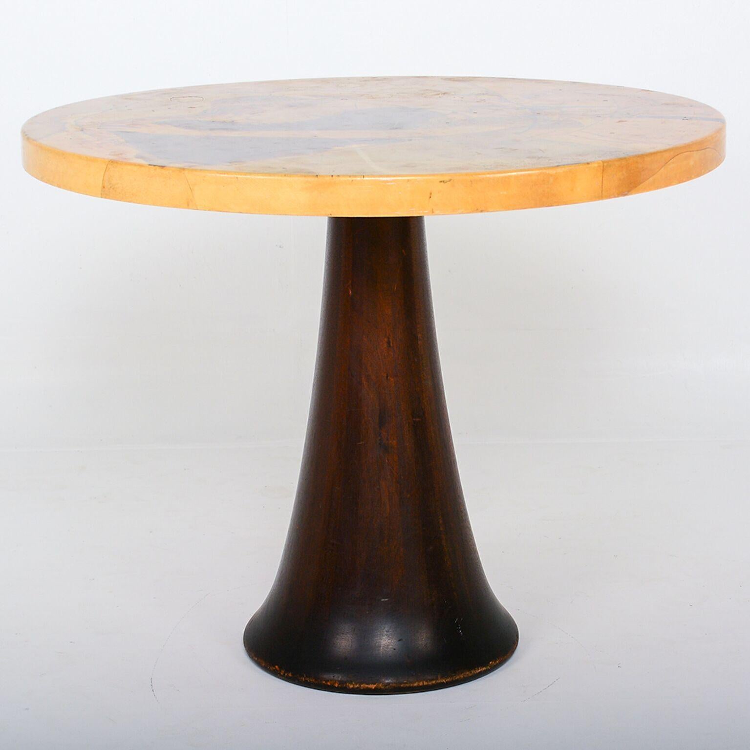 We are pleased to offer: a unique and elegant gueridon table. Designed and manufactured by Maria Teresa Mendez, in Mexico, circa 1960s. Beautiful quality, the goatskin is wrapped in the round wood top and hand painted. Signed with the artist