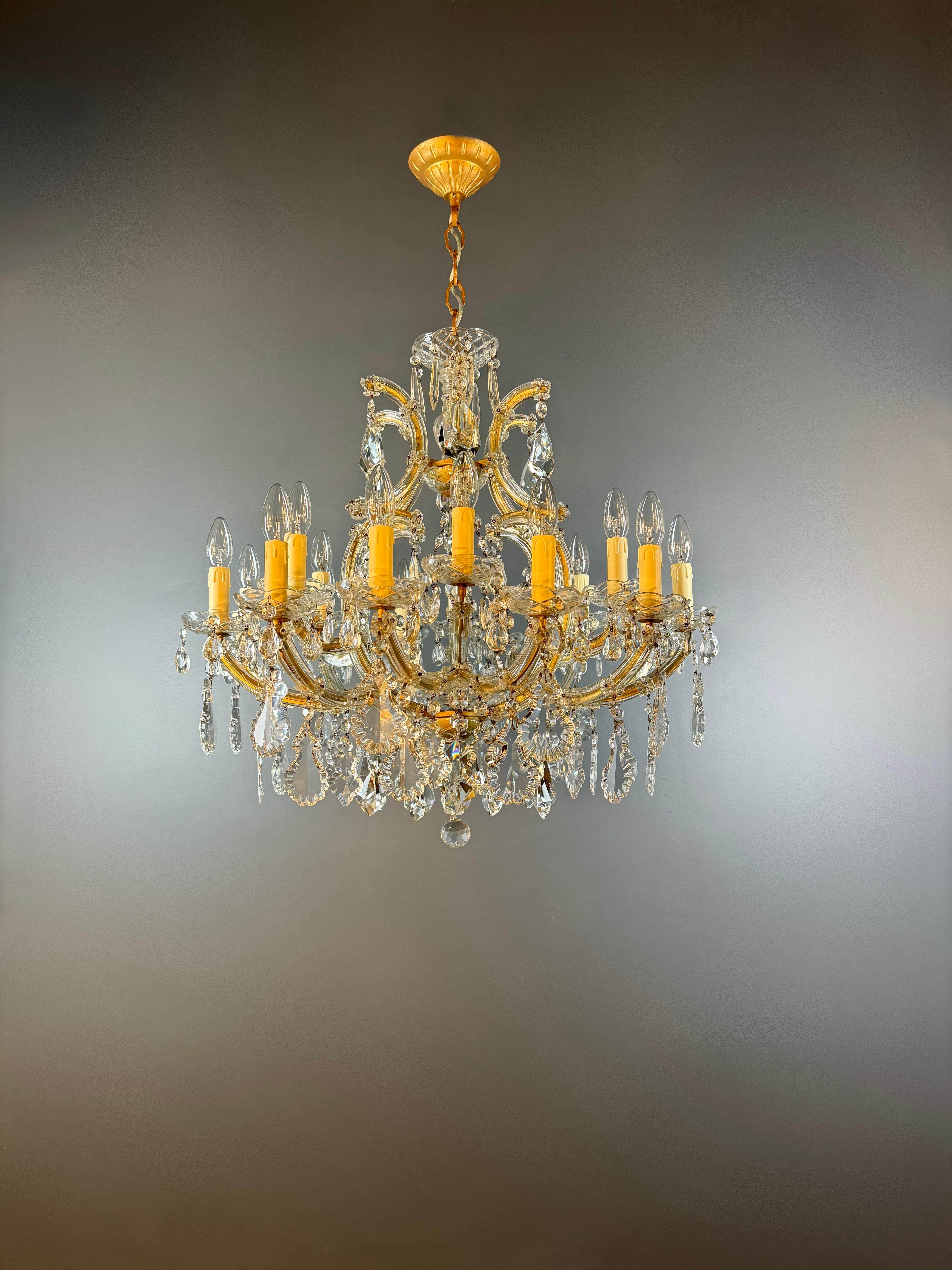 We present to you an exquisite Maria Theresa chandelier chandelier ceiling light made of brass in the Art Nouveau style - a real rarity and an antique jewel. This vintage chandelier was lovingly and professionally restored in Berlin and its