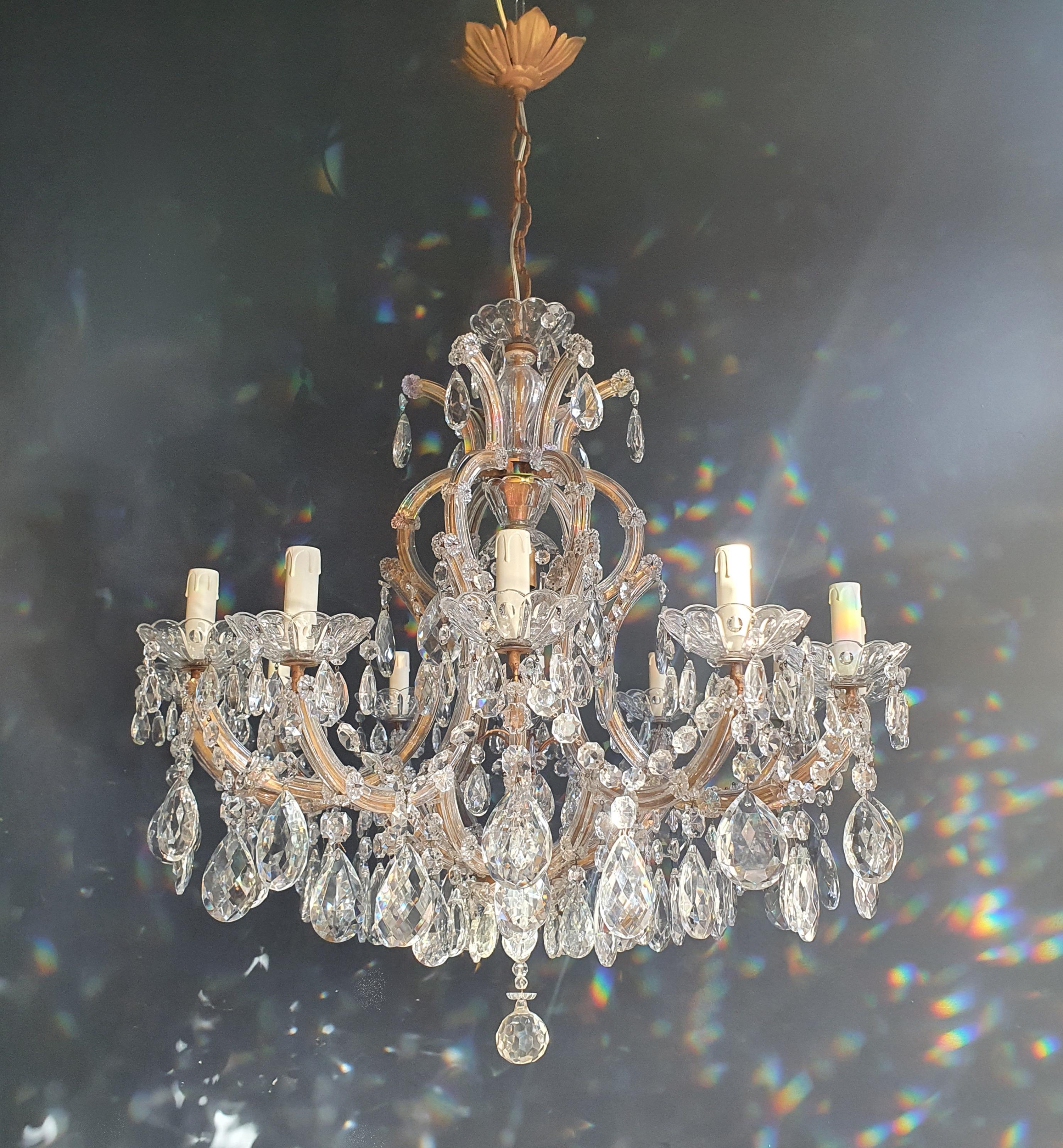 The frame is fully dressed all-over with glass. Cut crystal drops of different dimensions and shapes are hanging all-over the octagonal button chains, all around the chandelier.

Measures: Total height 120 cm, height without chain 80 cm, diameter