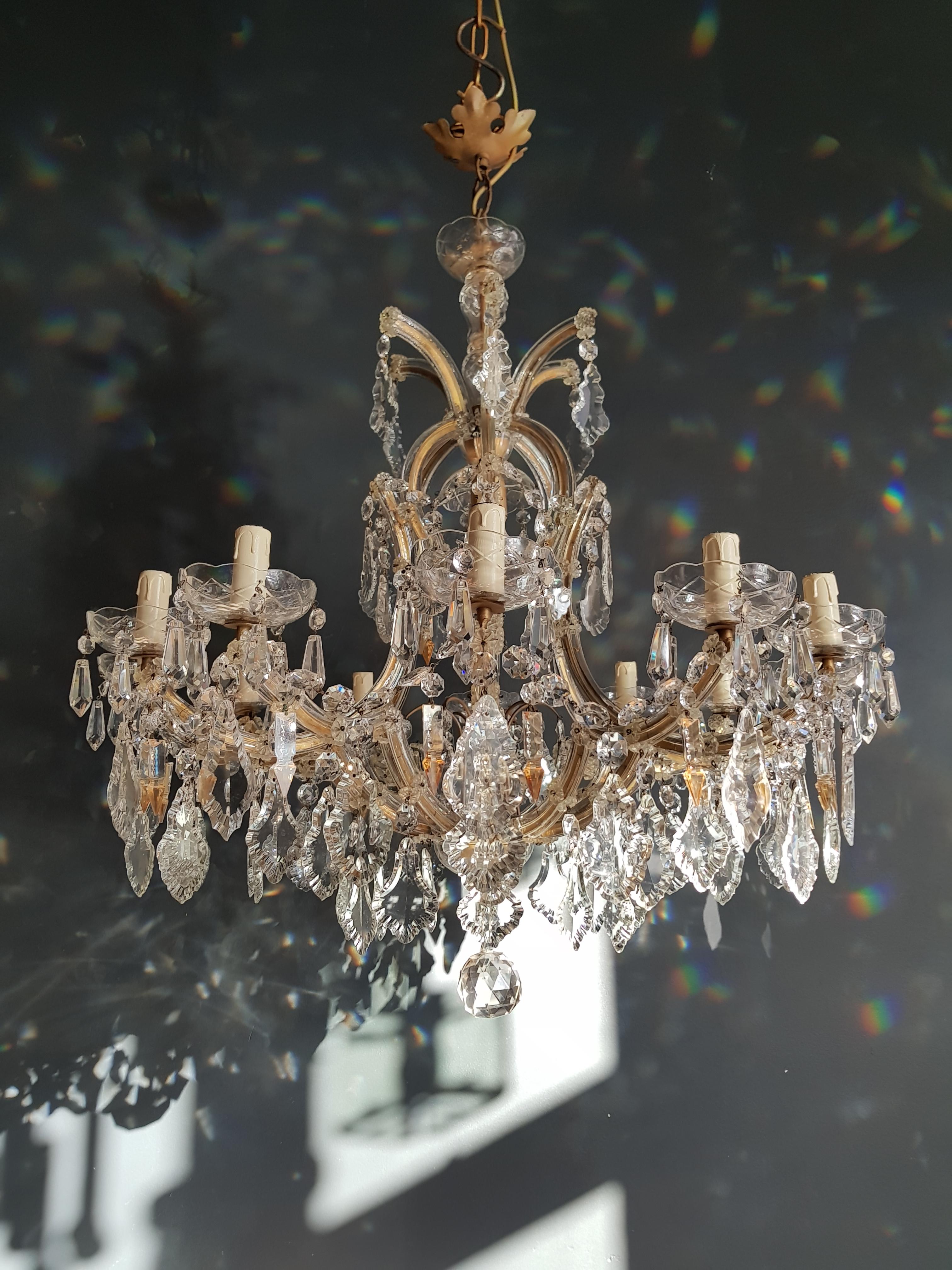 The frame is fully dressed all-over with glass. Cut crystal drops of different dimensions and shapes are hanging all-over the octagonal button chains, all around the chandelier.

Measures: Total height 150 cm, height without chain 90 cm, diameter
