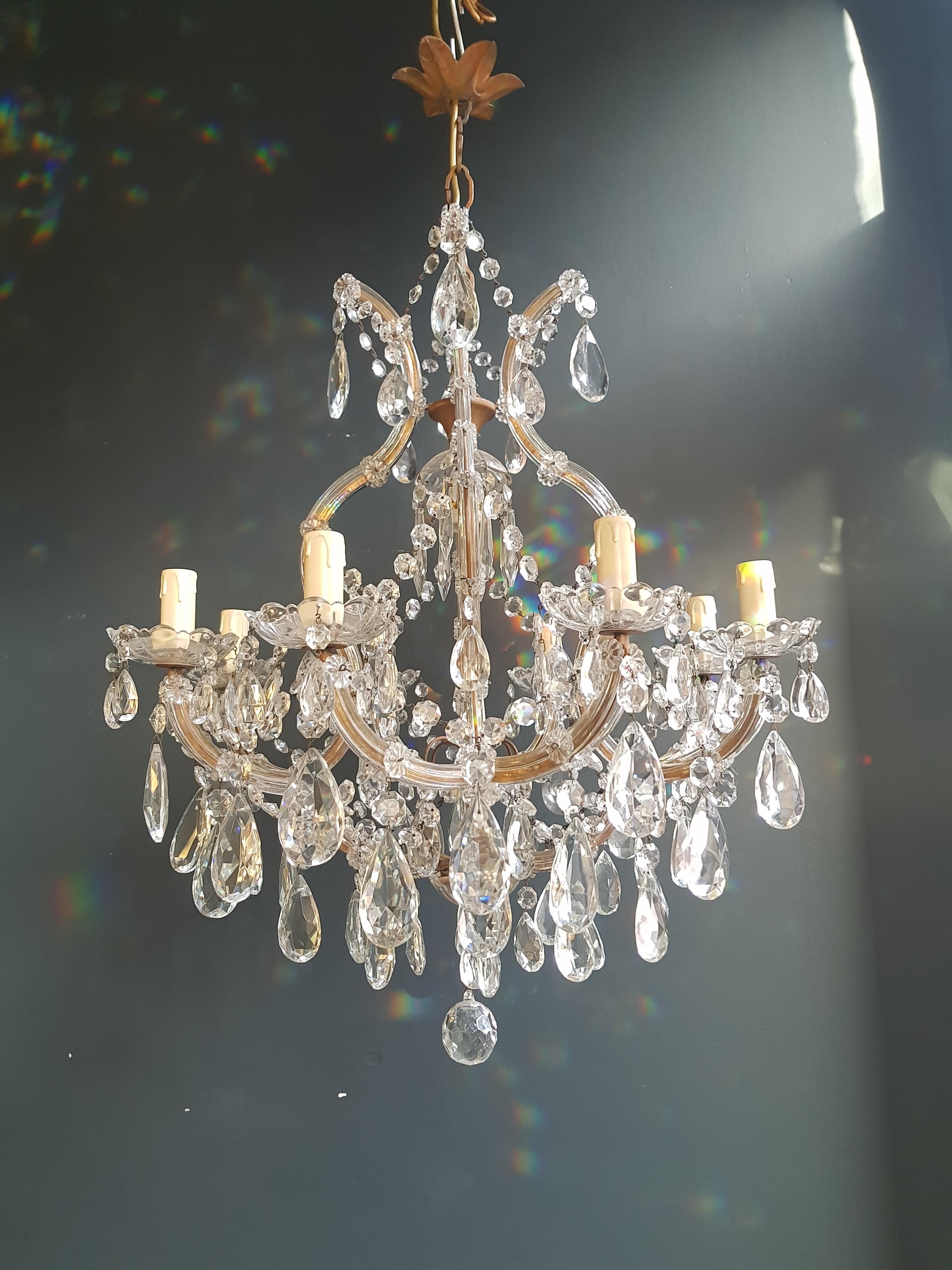 The frame is fully dressed all-over with glass. Cut crystal drops of different dimensions and shapes are hanging all-over the octagonal button chains, all around the chandelier.

Measures: Total height 150 cm, height without chain 70 cm, diameter 58