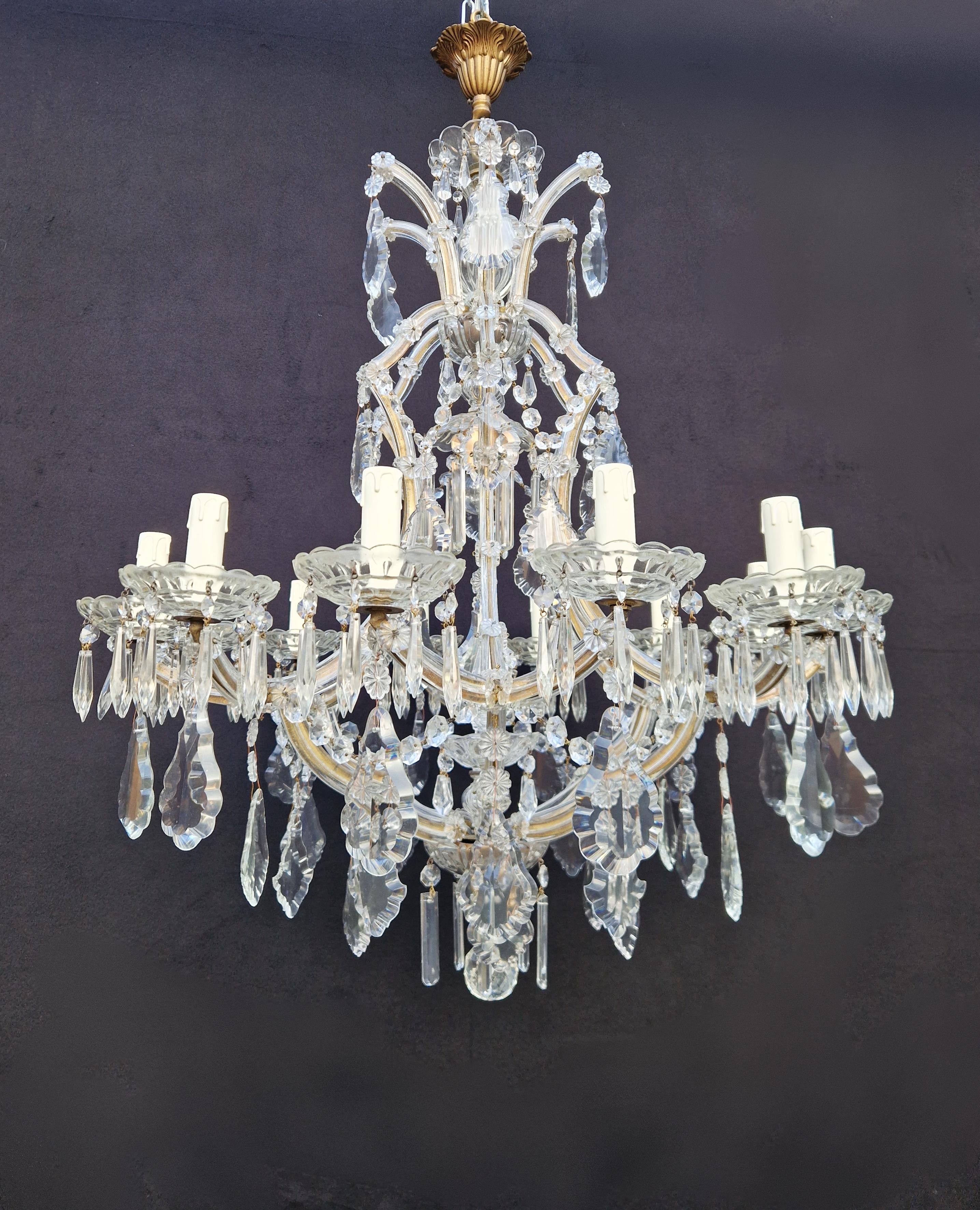 Presenting our beloved old chandelier, lovingly and professionally restored in Berlin. Its electrical wiring is suitable for use in the US, as it has been re-wired and is ready to be hung. Not a single crystal is missing, and each one has been