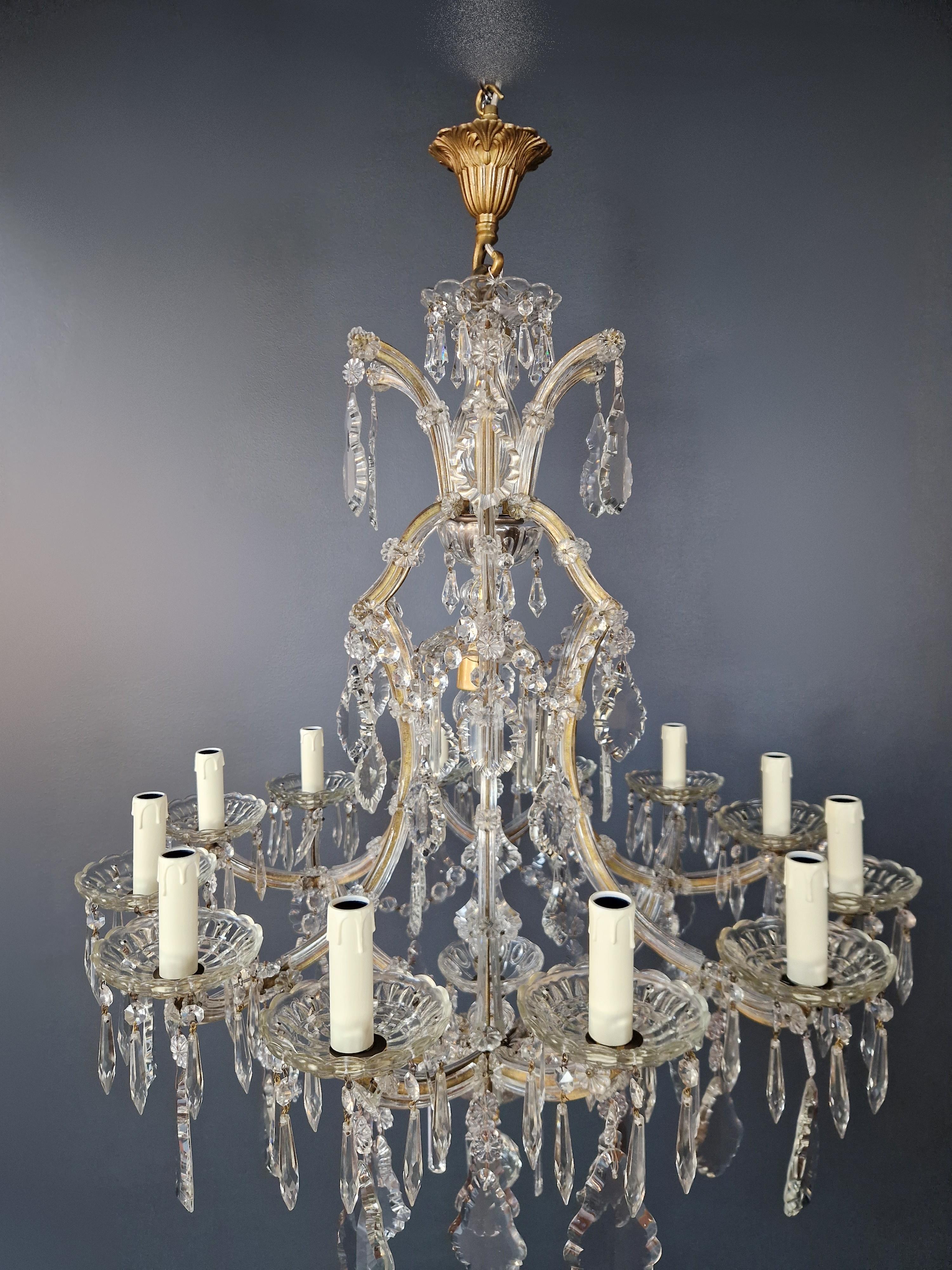 Introducing our cherished old chandelier, lovingly and professionally restored in Berlin! Its electrical wiring is compatible with the US, as it has been meticulously re-wired and is ready to be hung. Not a single crystal is missing, as the cabling
