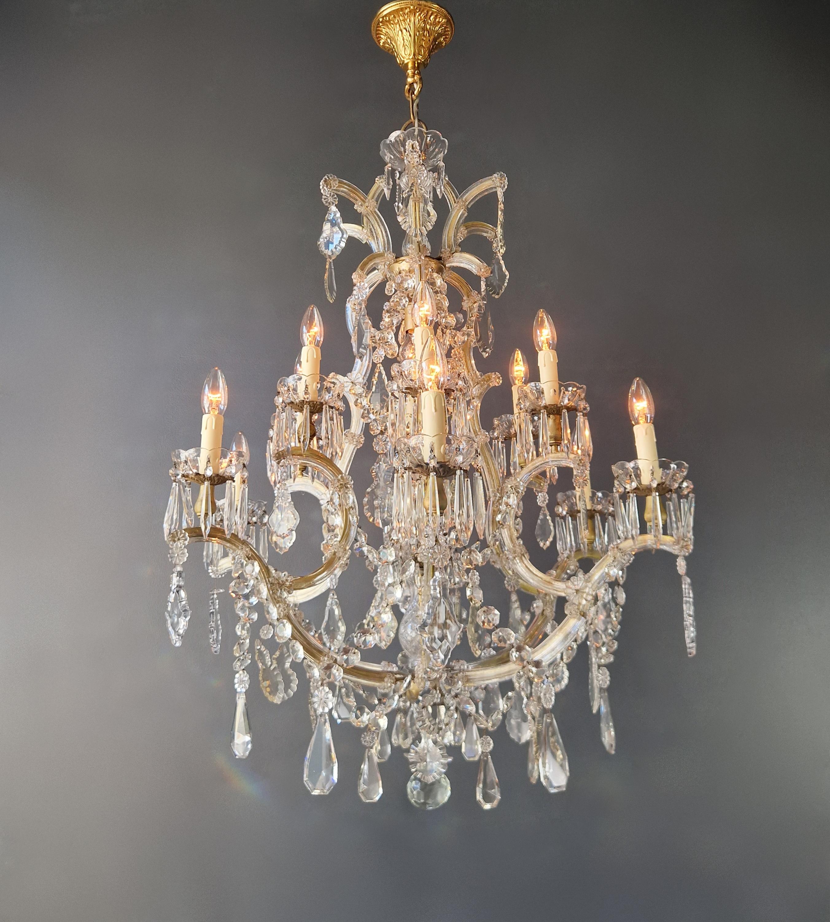 Introducing our cherished old chandelier, lovingly and professionally restored in Berlin! Its electrical wiring is compatible with the US, as it has been meticulously re-wired and is ready to be hung. Not a single crystal is missing, as the cabling