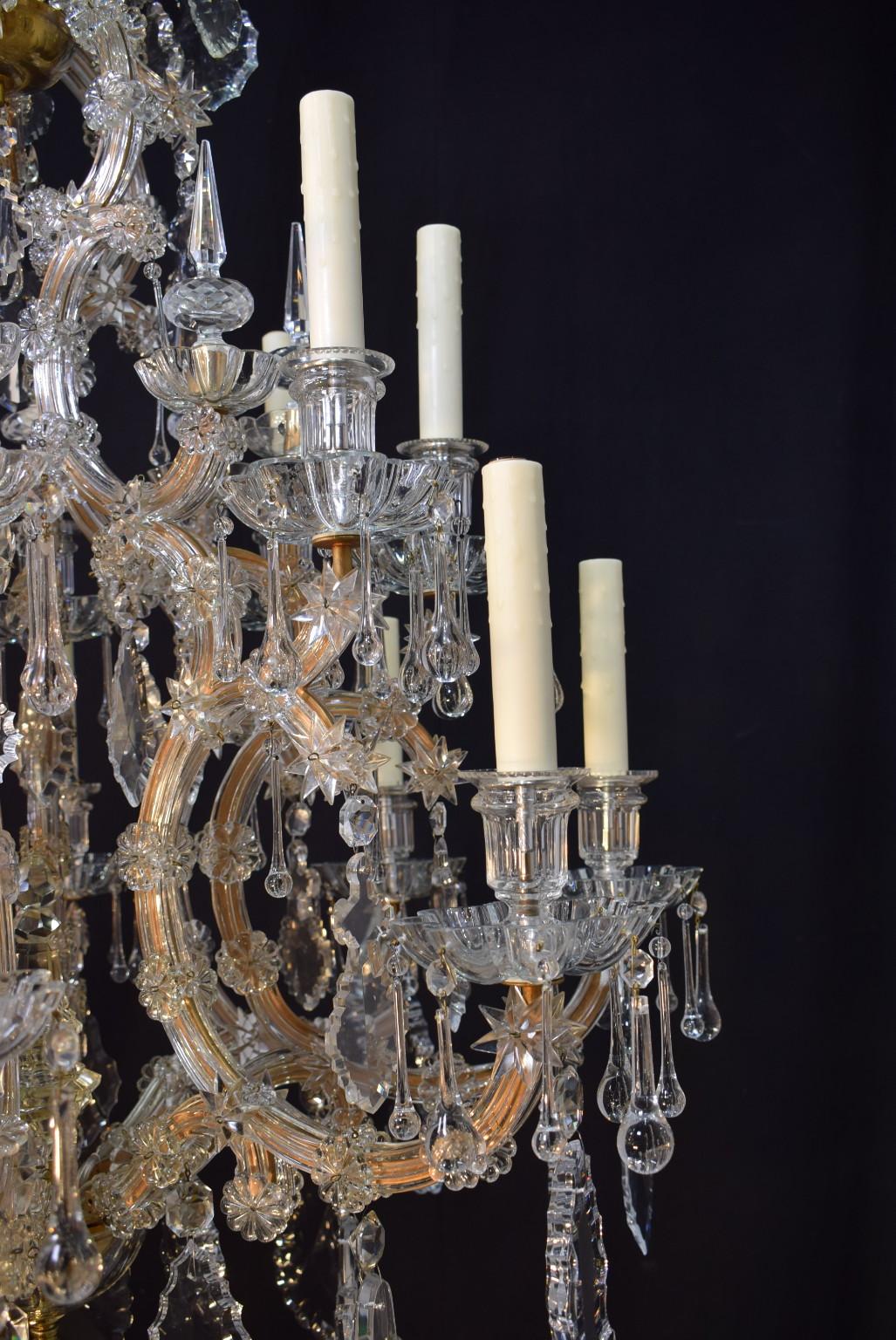 A magnificent gilt iron and crystal Maria Theresa chandelier.  