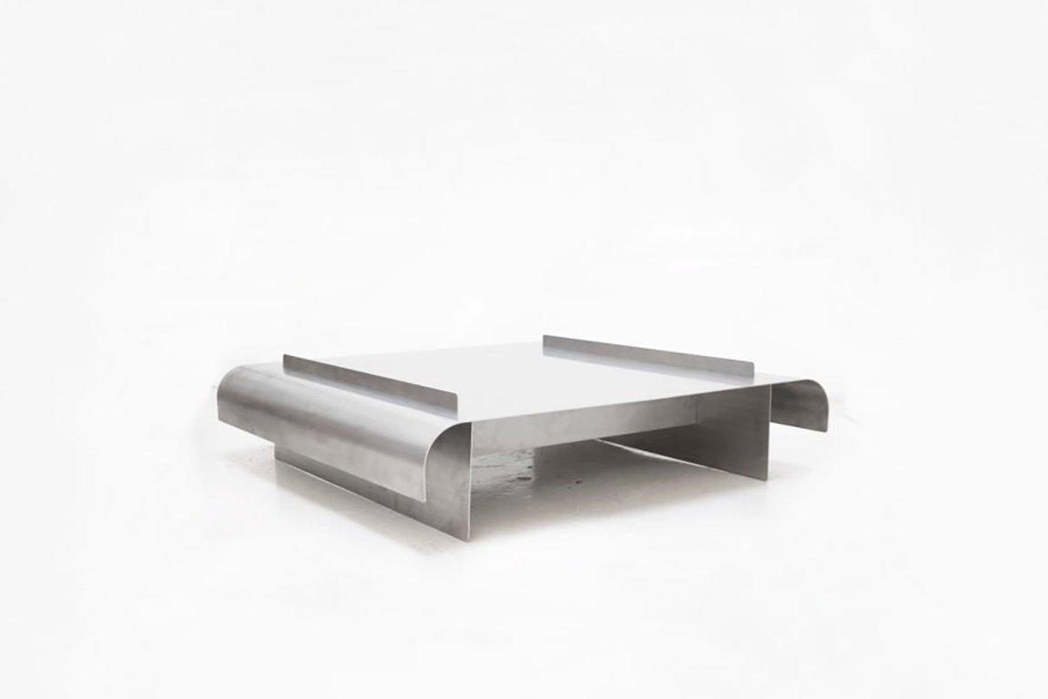 MARIA TYAKINA

Bend Table Low,
Produced exclusively for Side Gallery
The Netherlands, 2019
Stainless Steel, hand brushed

Measurements
89 x 89 x 24h cm
35 x 35 x 9,44h in

Edition
Numbered edition

Biography
Navigating between art and