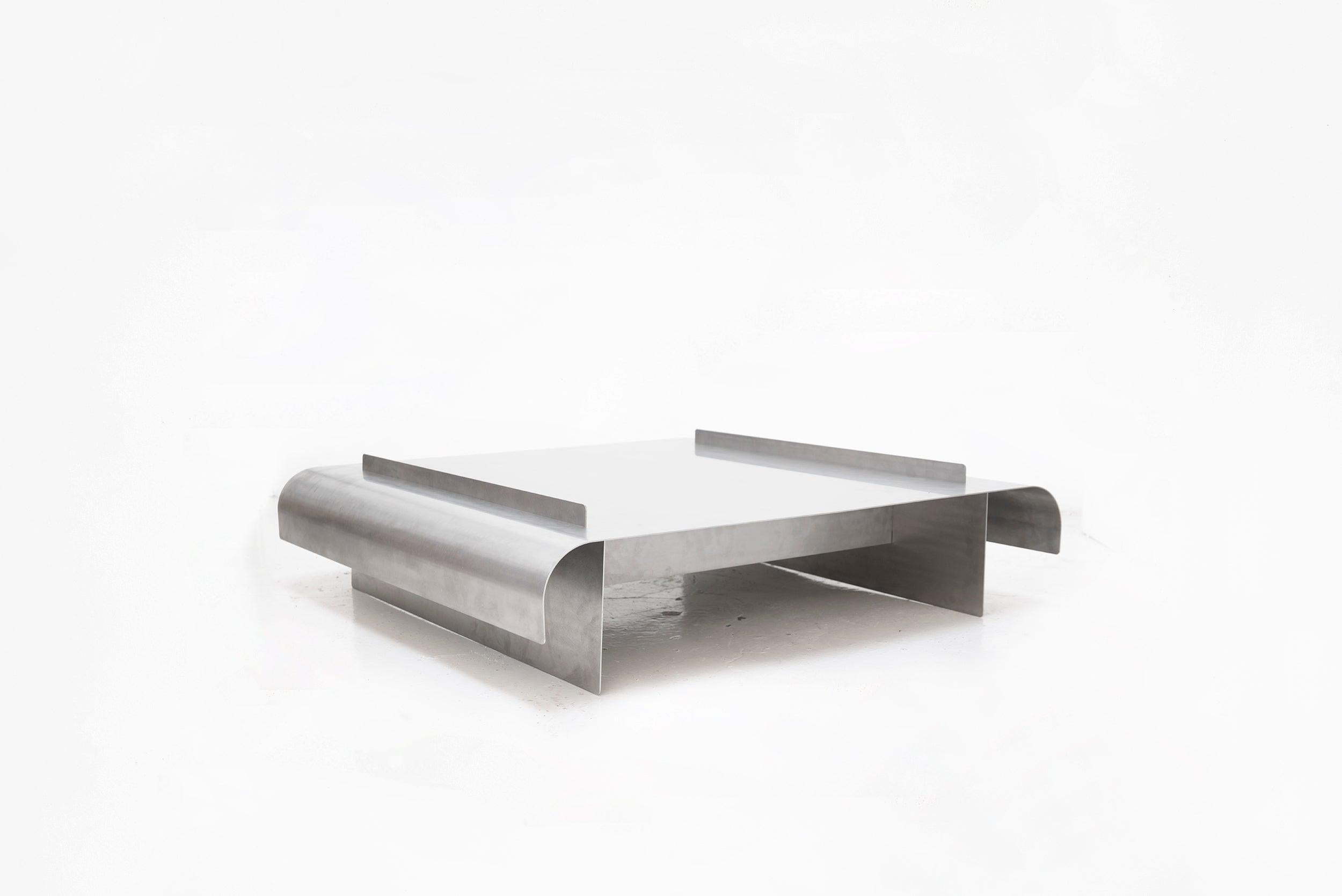 Maria Tyakina
Bend table low
Produced exclusively for Side Gallery The Netherlands, 2019
Stainless steel, hand brushed.

Measurements: 89 x 89 x 24 H cm 35 x 35 x 9.44 H in
Edition Numbered edition

Biography
Navigating between art and