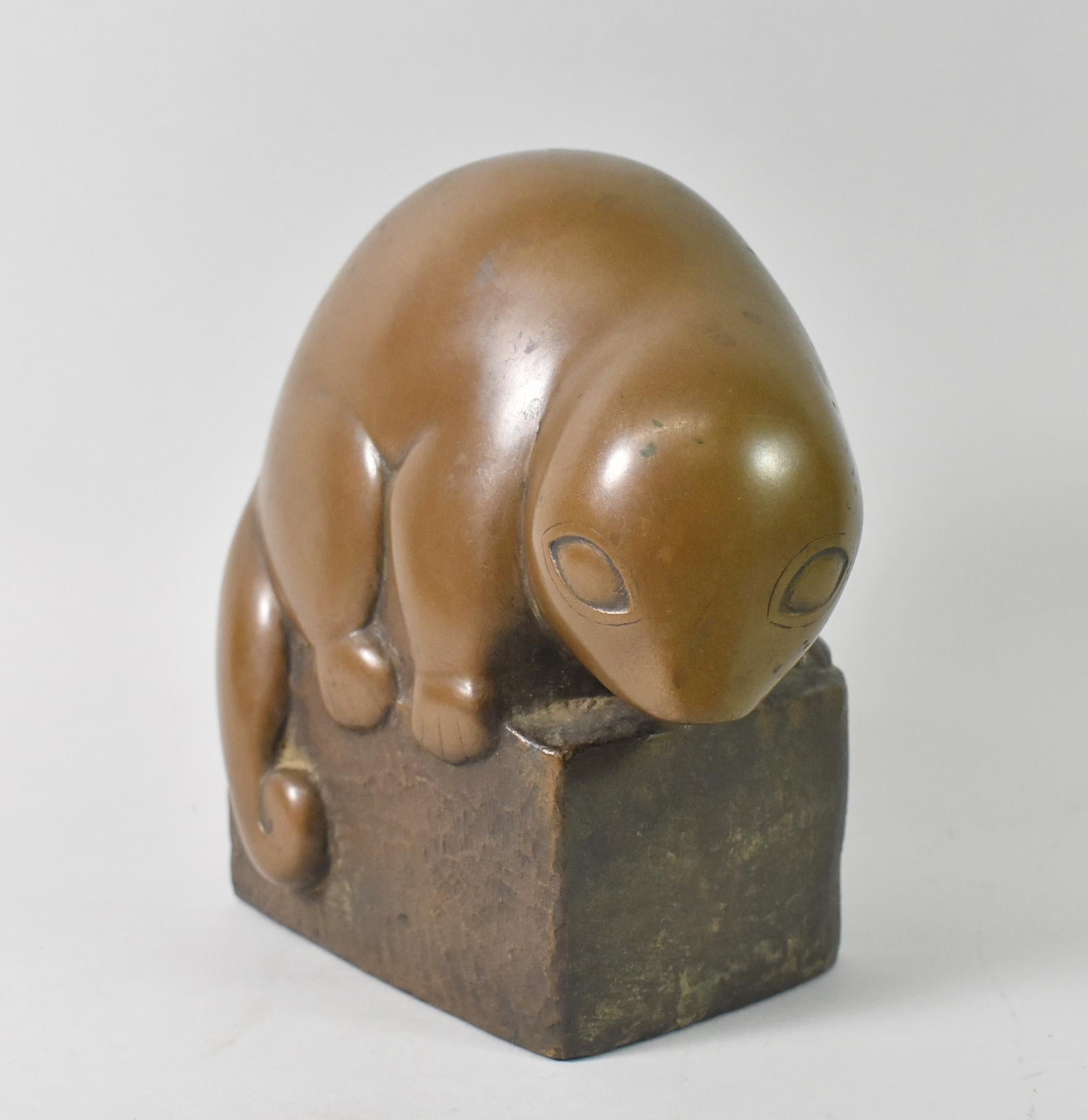 Marian Weisberg stylized composition sculpture of an opossum / Cuscus. Rich golden brown patina. Signed on the back side. 