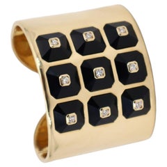 MARIANA CANALE Manschettenarmband aus 18kt Gelbgold mit Diamanten und Onyx