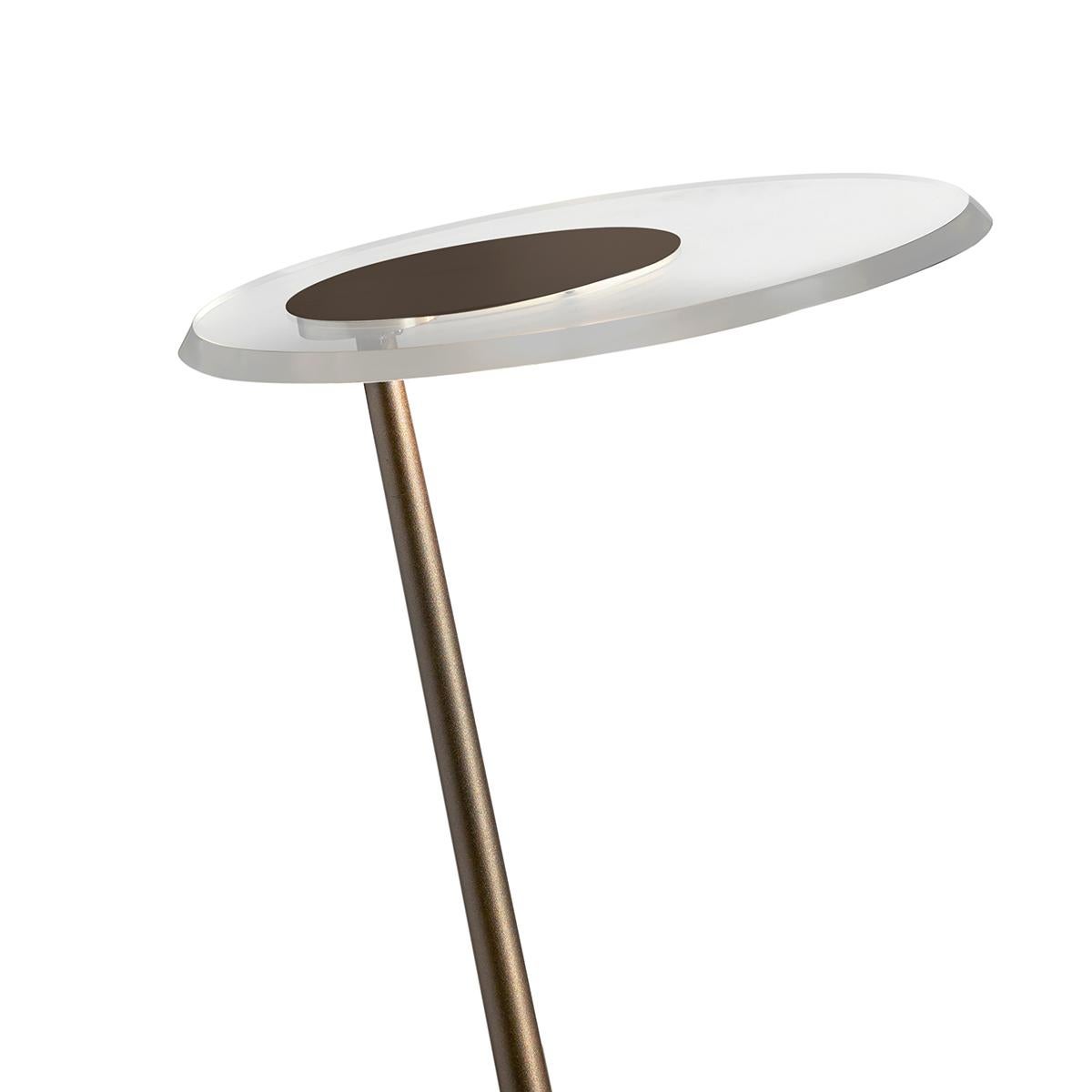 Outdoor lamp 'Amanita' designed by Mariana Pellegrino in 2019. Outdoor led lamp giving direct light in painted metal with sloped conical stem. Indian brown finish. PMMA transparent diffuser disk. Manufactured by Oluce, Italy.

Amanita is a reading
