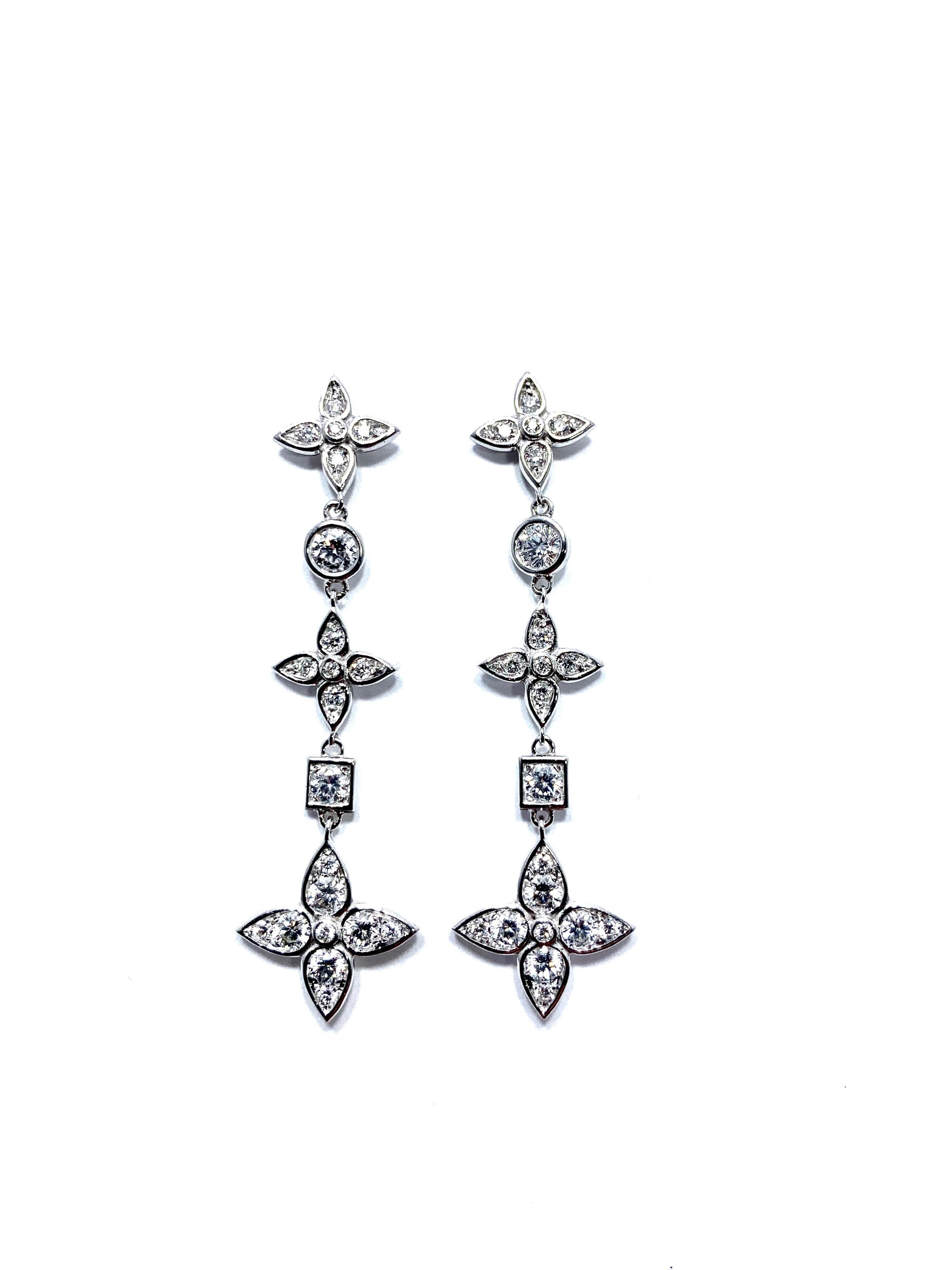 Handcrafted in Italy by Mariani Gioielli this stunning pair of Diamond drop earrings will light up the night!  The 42 round brilliant Diamonds have a total weight of 1.92 carats set in 18 karat white gold.  They are E/F color, VVS2 clarity.  The
