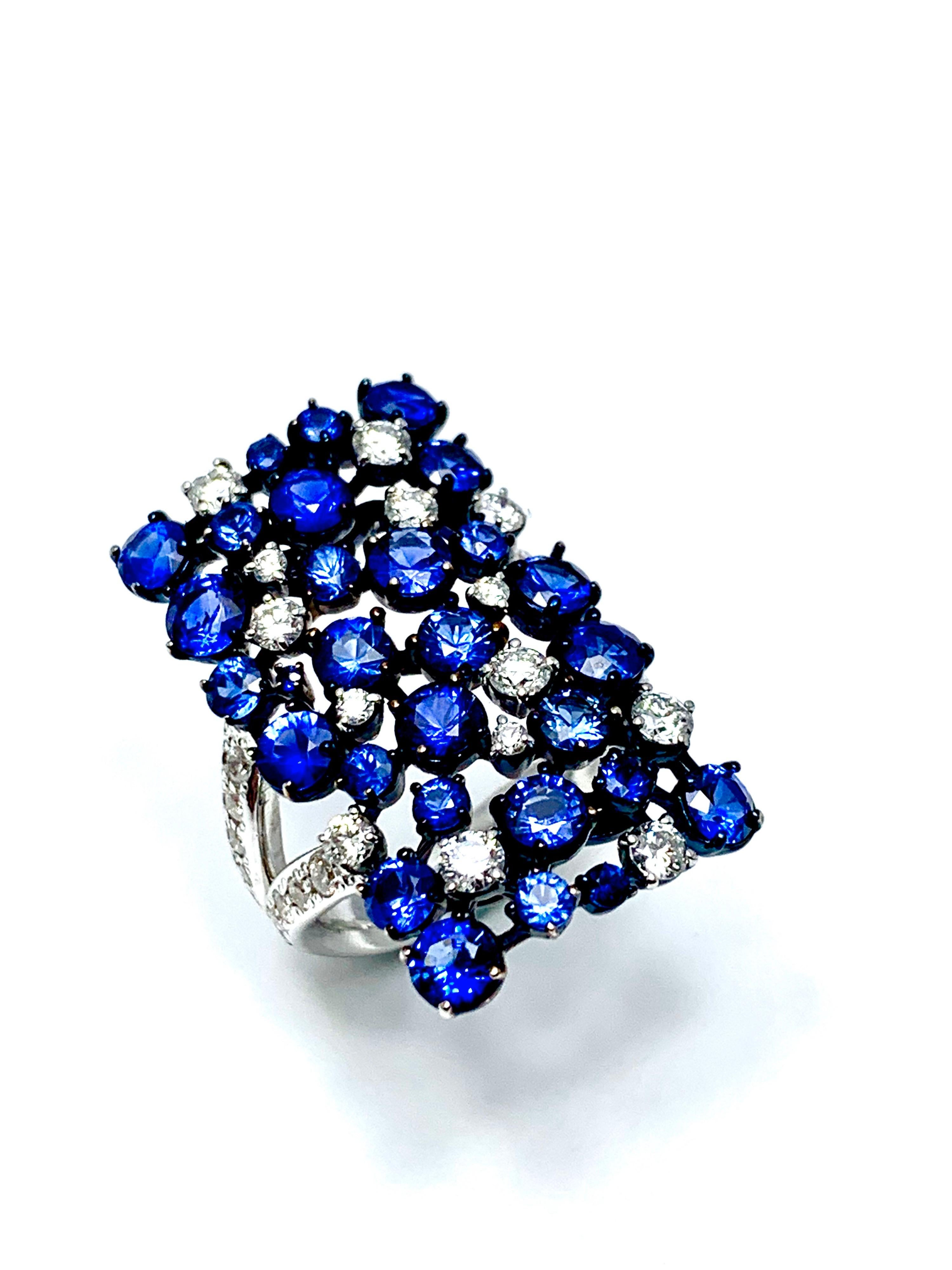 Handcrafted in Italy by Mariani Gioielli this stunning 18k white and blue gold ring will make a statement.  Adorned with 5.15 carats of round faceted sapphires, and 1.50 carats of round brilliant diamonds, this ring is a show stopper.  The diamonds