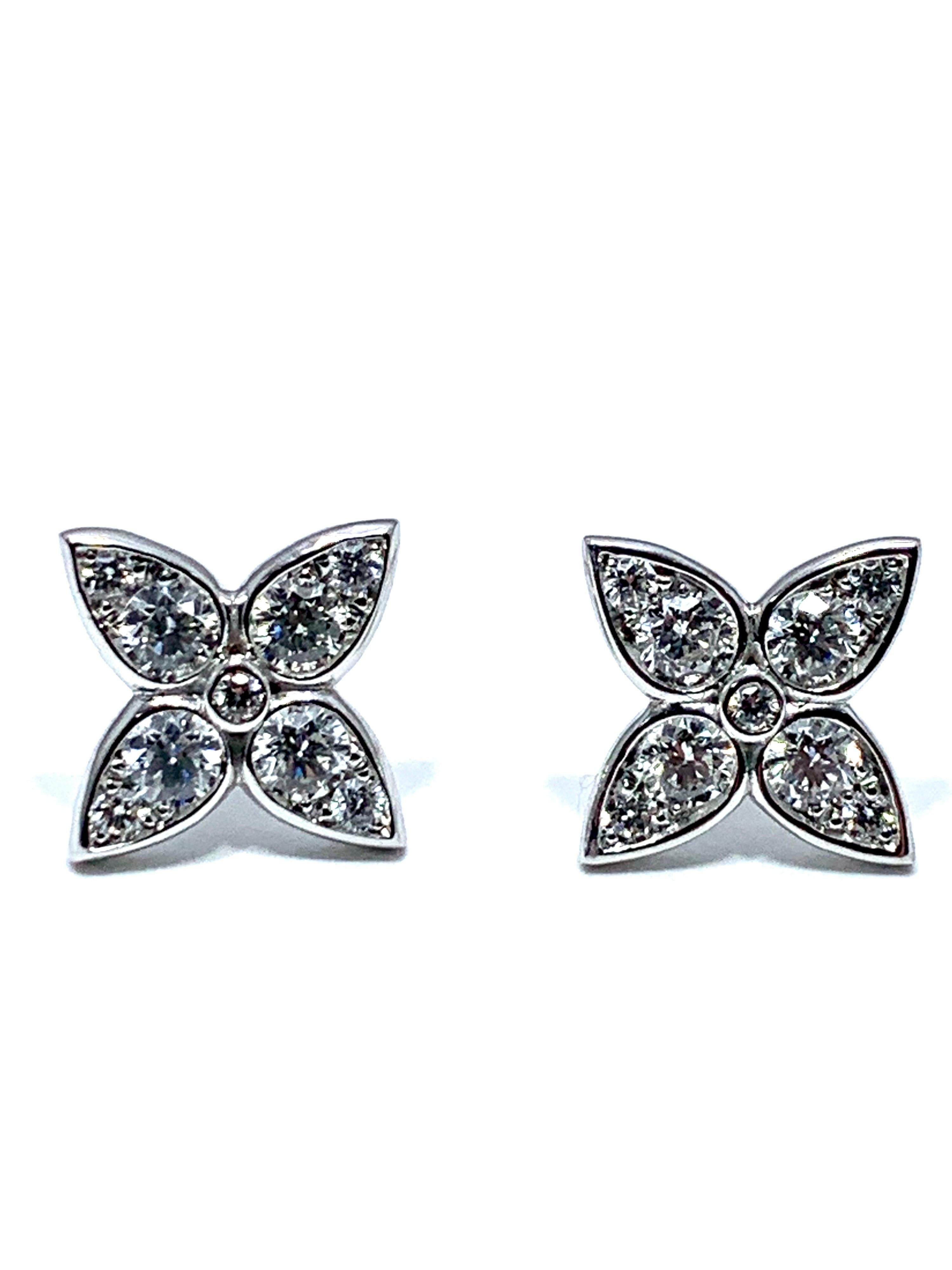 Handcrafted in Italy by Mariani Gioielli this pair of round brilliant Diamond and 18 karat white gold stud earrings are simply stunning.  The 18 Diamonds have a total weight of 1.02 carats.  The Diamonds are graded as E/F color, VVS2 clarity.  The