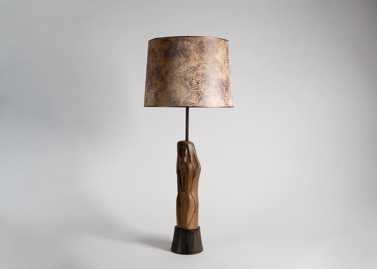 A sleek, glazed ceramic midcentury table lamp. Shade sold separately.