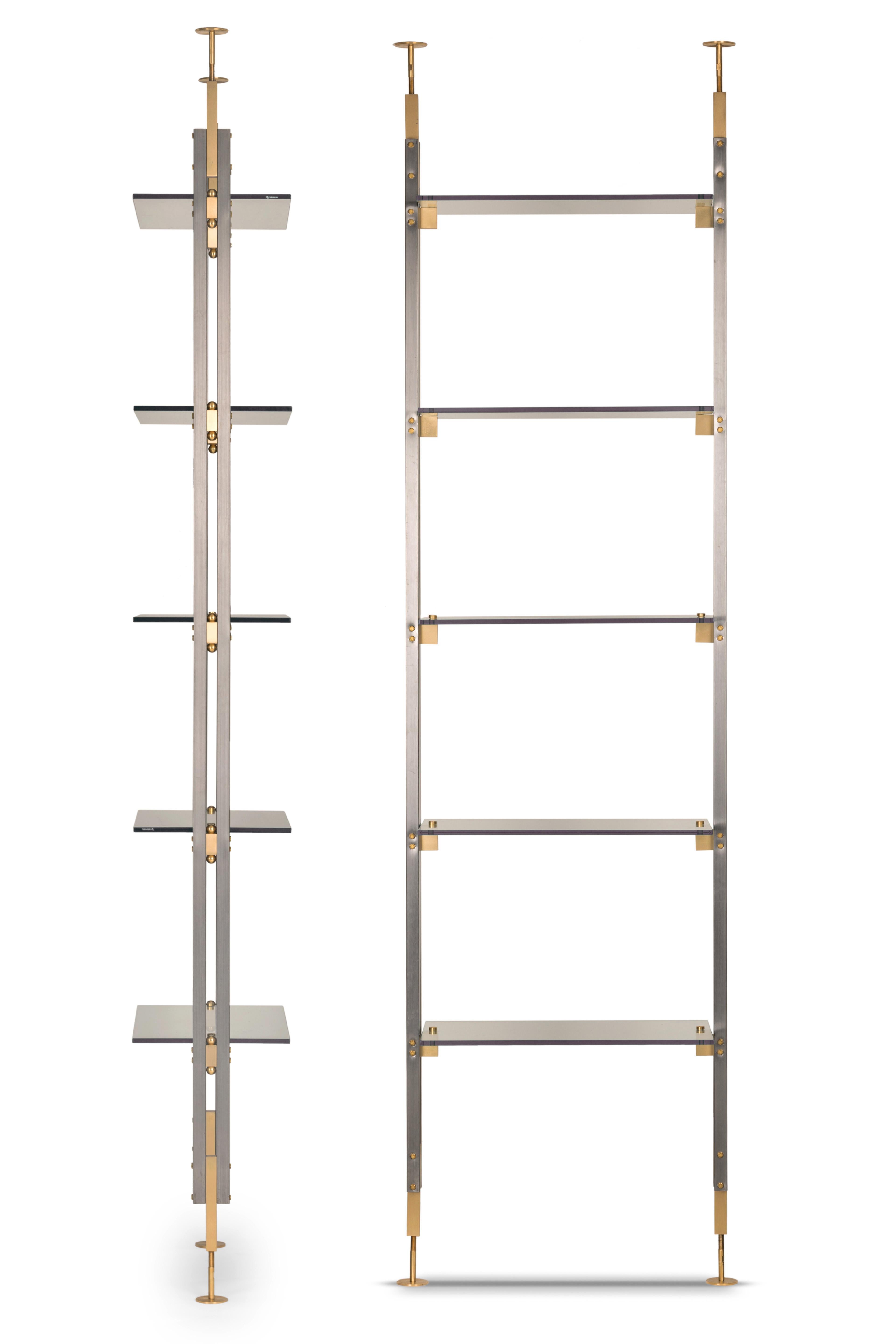 Marianne bookshelf by Mingardo
Dimensions: D62 x W30 x H240 cm 
Materials: Matte nickel structure, tempered glass shelves. Natural brass details with spheres.
Weight: 60 kg
Also Available in different finishes and dimensions.

A thin, elegant,