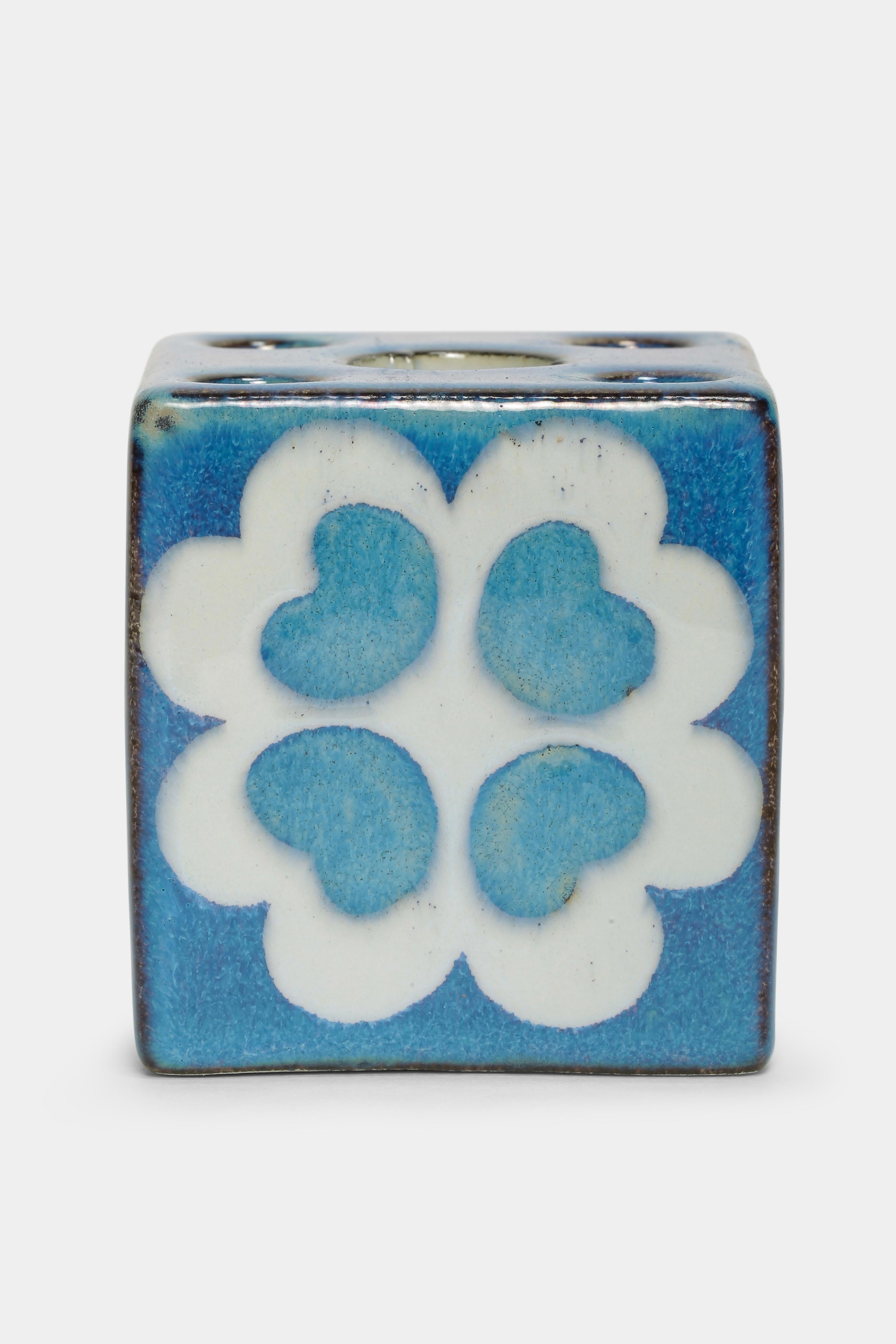 Marianne Johnson candleholder made by Royal Copenhagen in the 1960s in Denmark. Cube painted with a bright blue color. Marked an the bottom with the designer’s initials and numbered 432/3500.