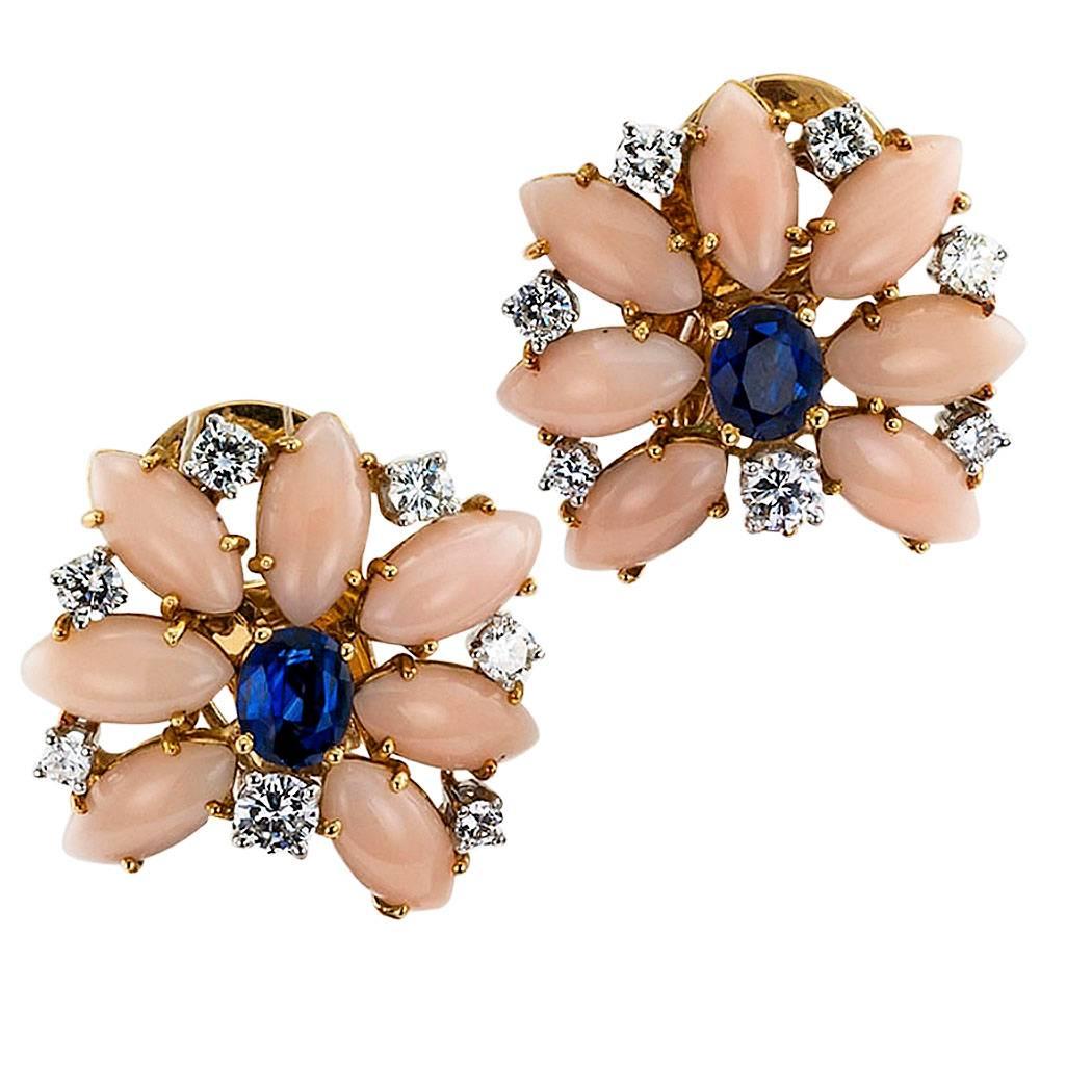 Marianne Ostier 1960s coral sapphire and diamond clip on drop earrings mounted in 18 karat gold and platinum. The matching designs feature detachable drops, for day-into-night flexibility, teardrop-shaped, articulated pendants set with coral and