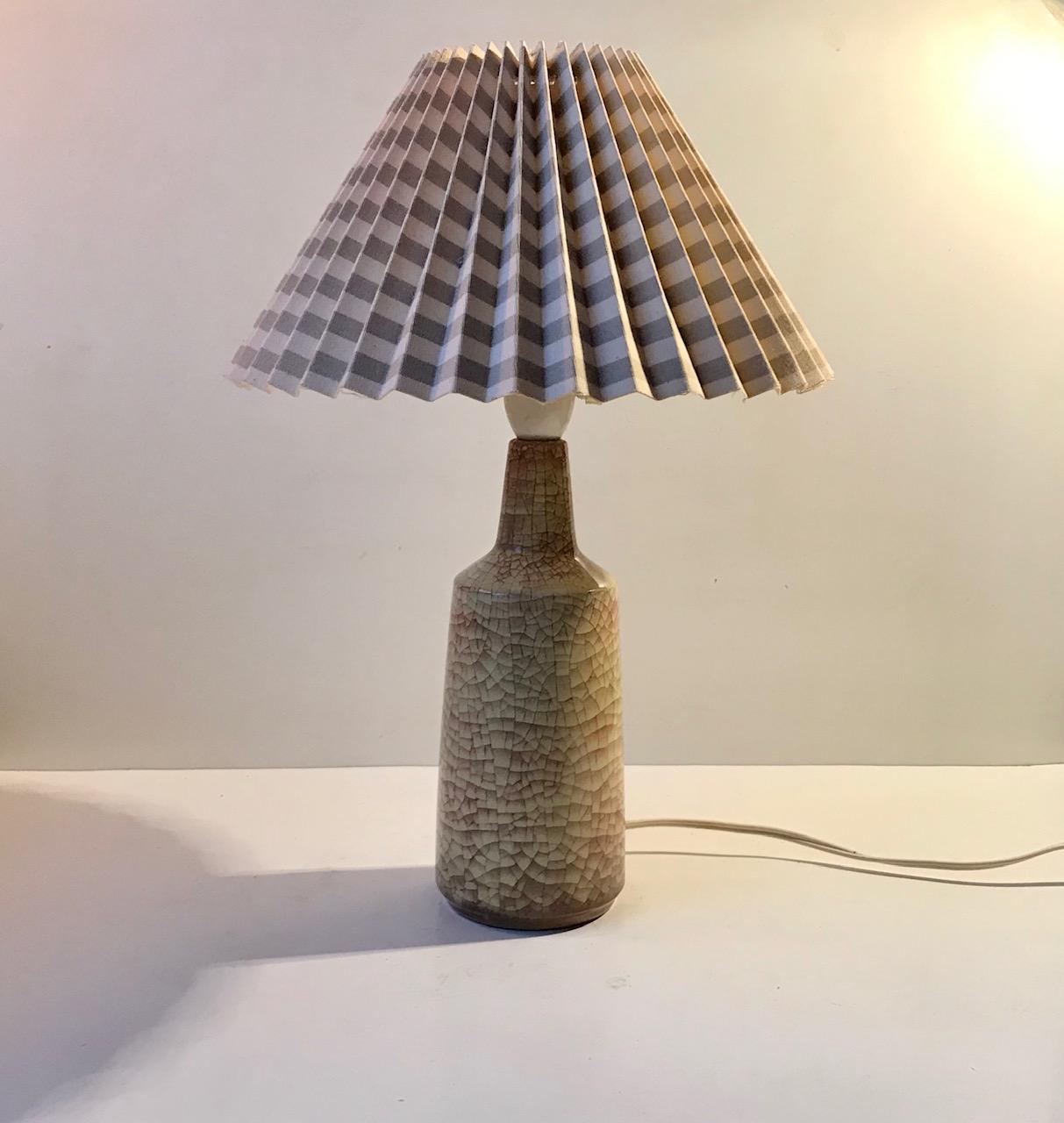 Table lamp designed by Marianne Starck for Michael Andersen & Son, Denmark. Delicate and dusty pastel 'Persia' glazes that imitates cracks. The height of 11 inches (39 cm) is without shade and with bulb. The shade in the photos is a model shade so