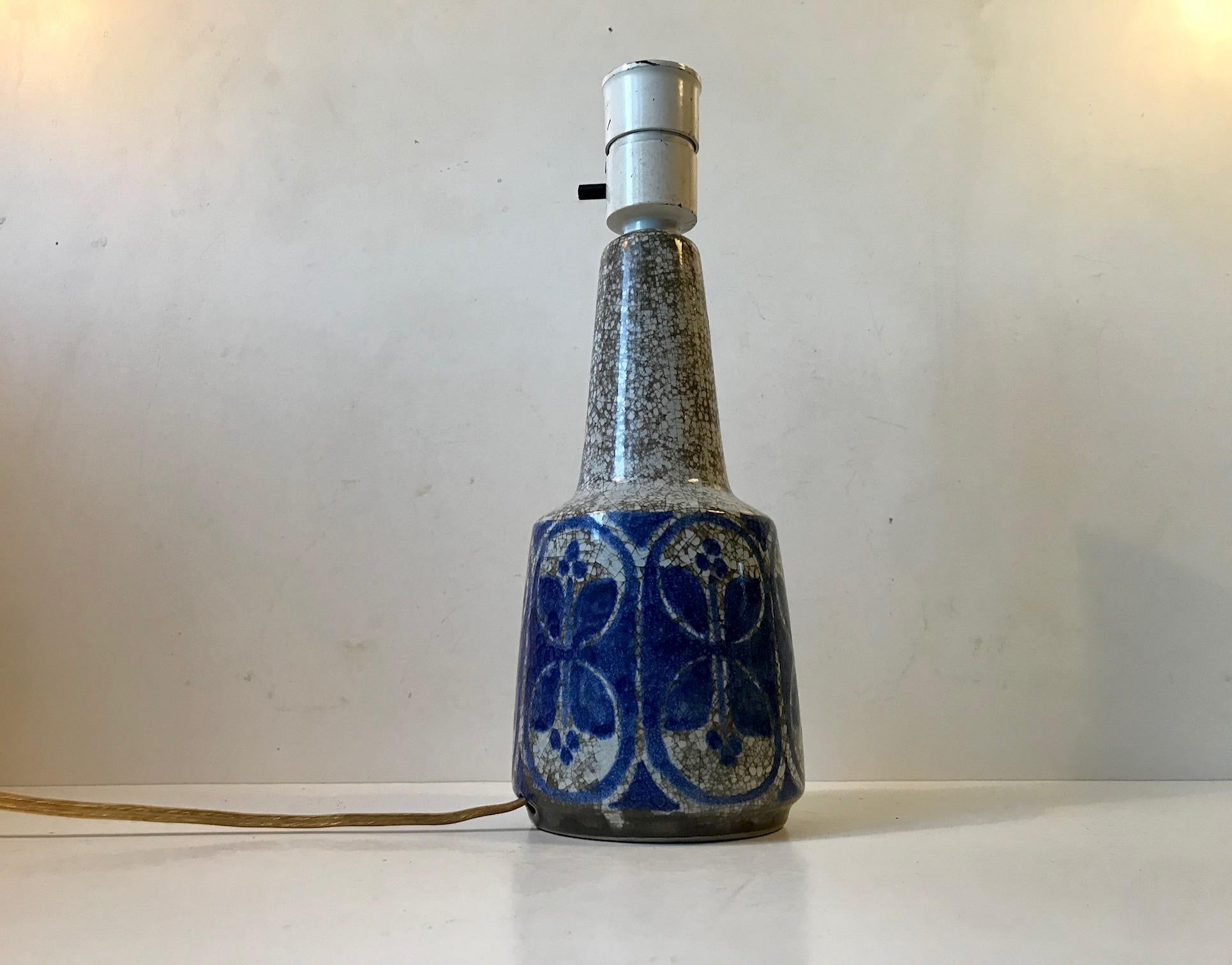 Table lamp designed by Marianne Starck for Michael Andersen & Son, Denmark. Signature Starck Glaze with blue glaze on dusty earthy 'Persia' back-glaze. The height of 11 inches (28 cm) is without shade and bulb. The shade in the photos is a model