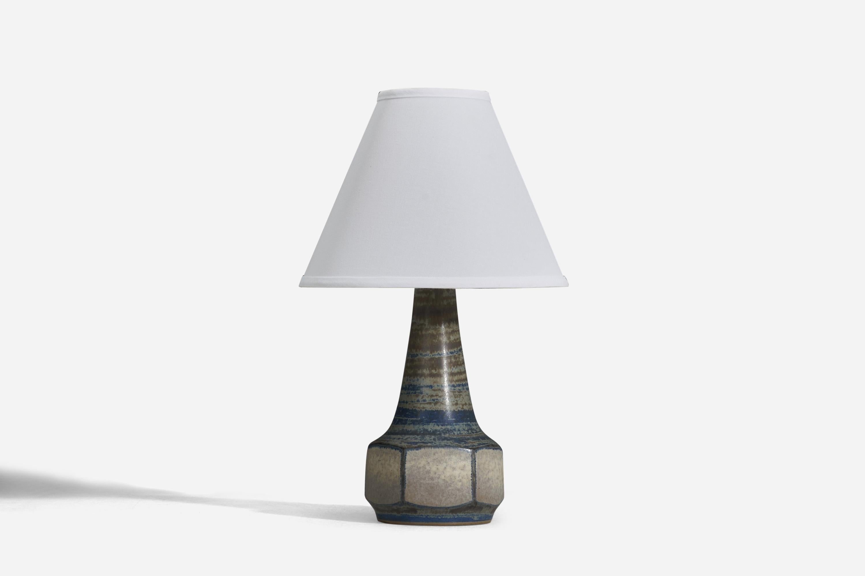 A blue and grey glazed stoneware table lamp designed by Marianne Starck and produced by Michael Andersen, Denmark, 1960s.

Sold without Lampshade
Dimensions of Lamp (inches) : 12.18 x 5.28 x 5.28 (Height x Width x Depth)
Dimensions of Lampshade