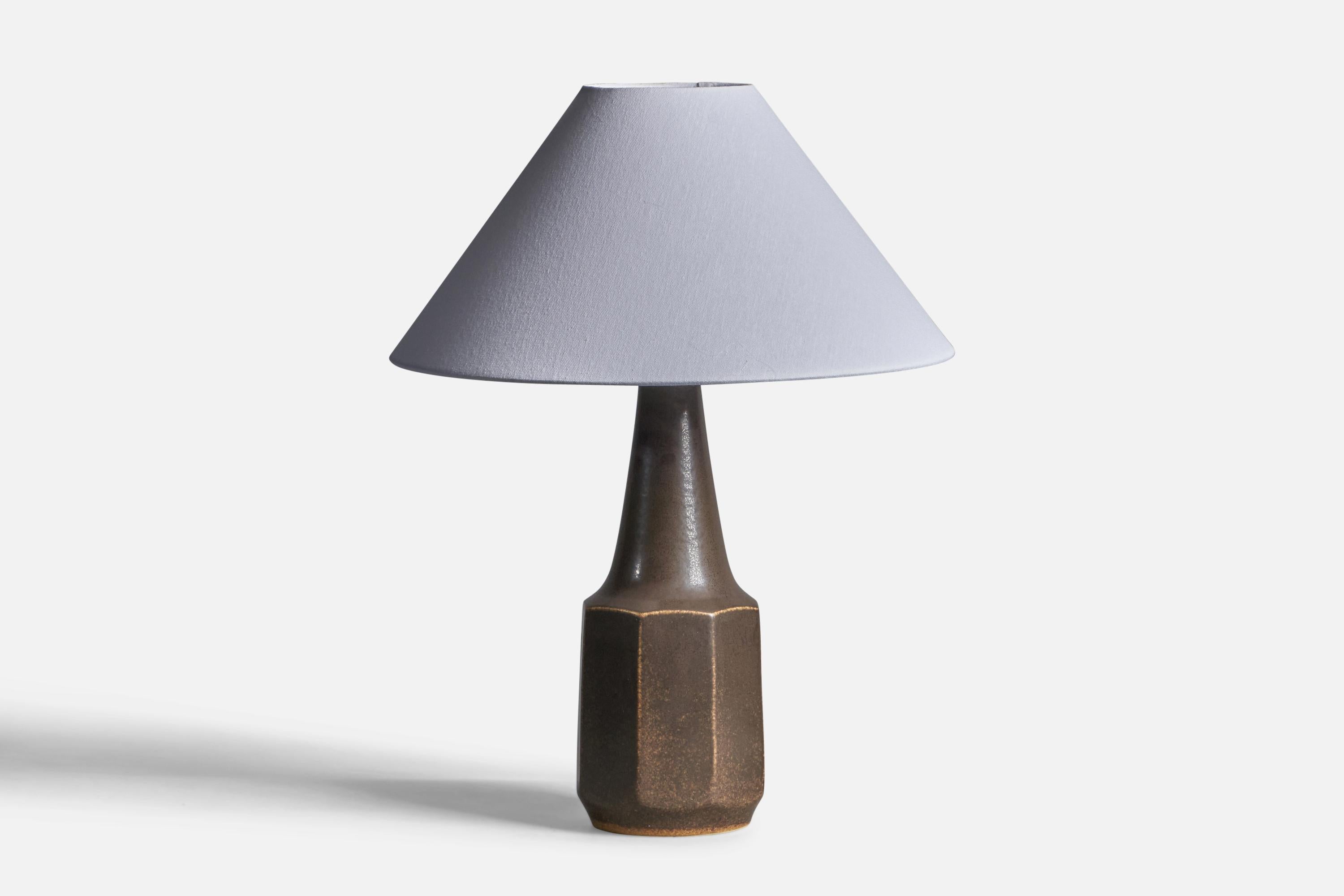 A brown-glazed stoneware table lamp, designed by Marianne Stark and produced by Michael Andersen, Bornholm, Denmark, 1960s.

Dimensions of Lamp (inches): 16.4